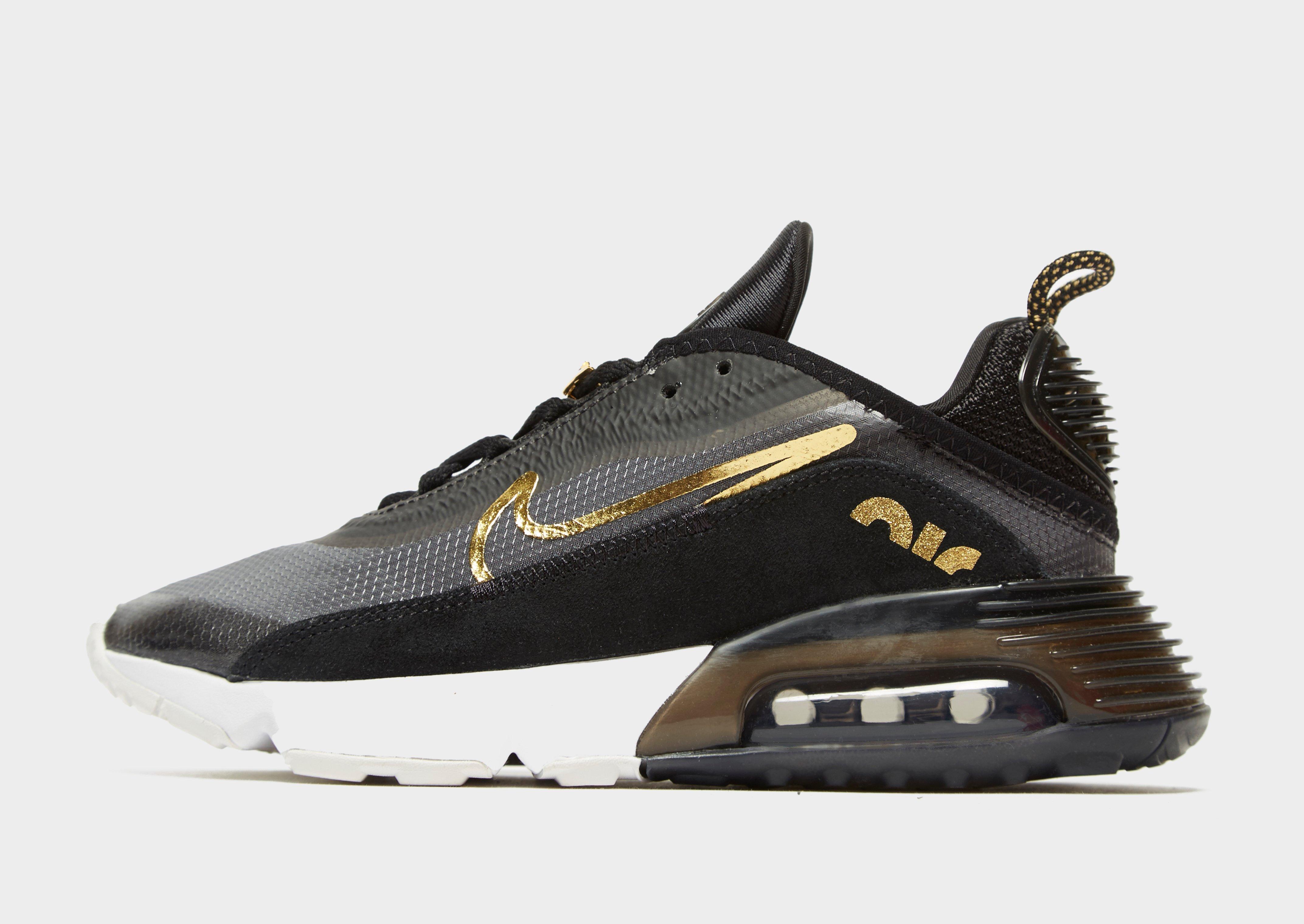 ladies black and gold nike trainers