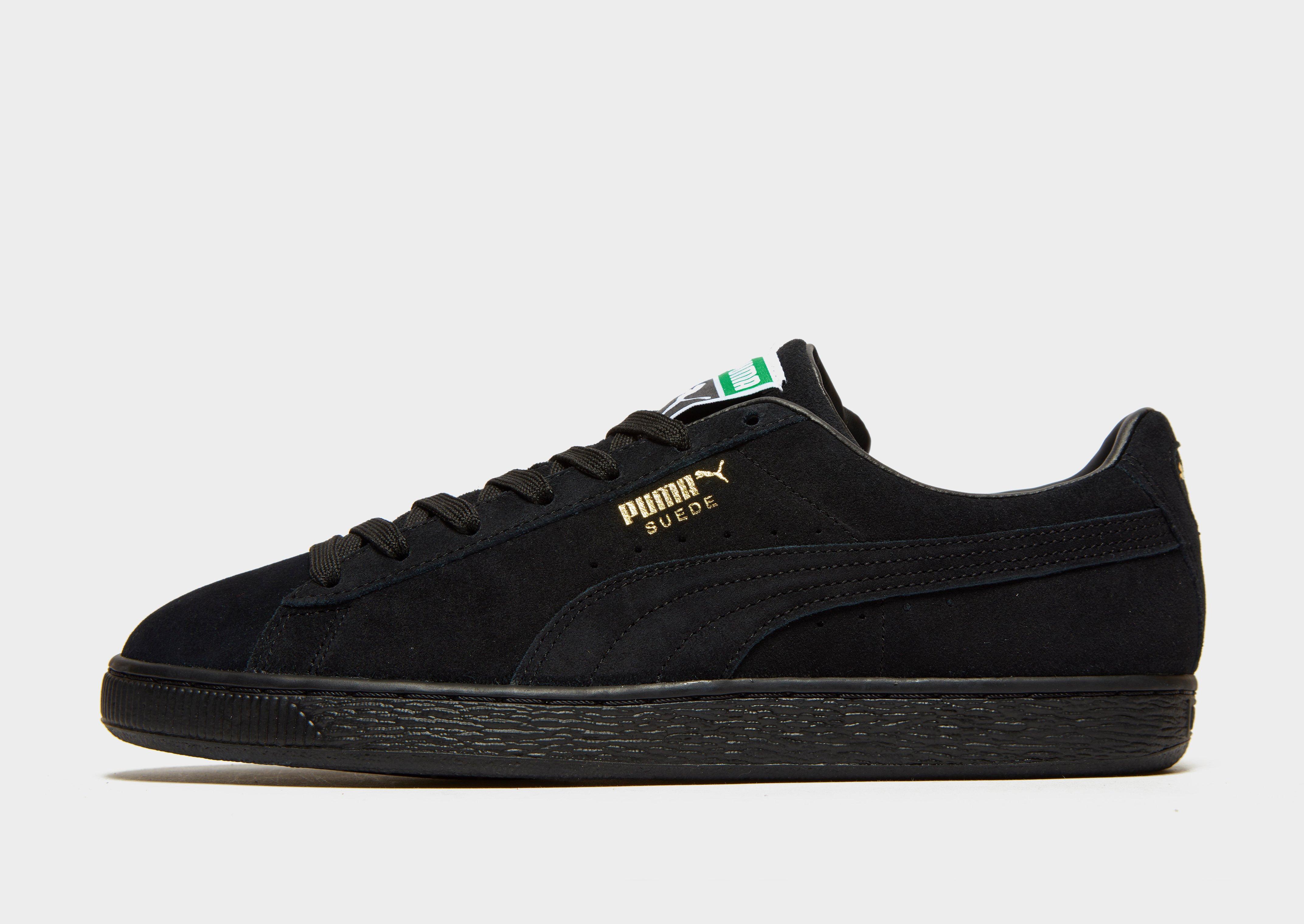 puma suede black and tan