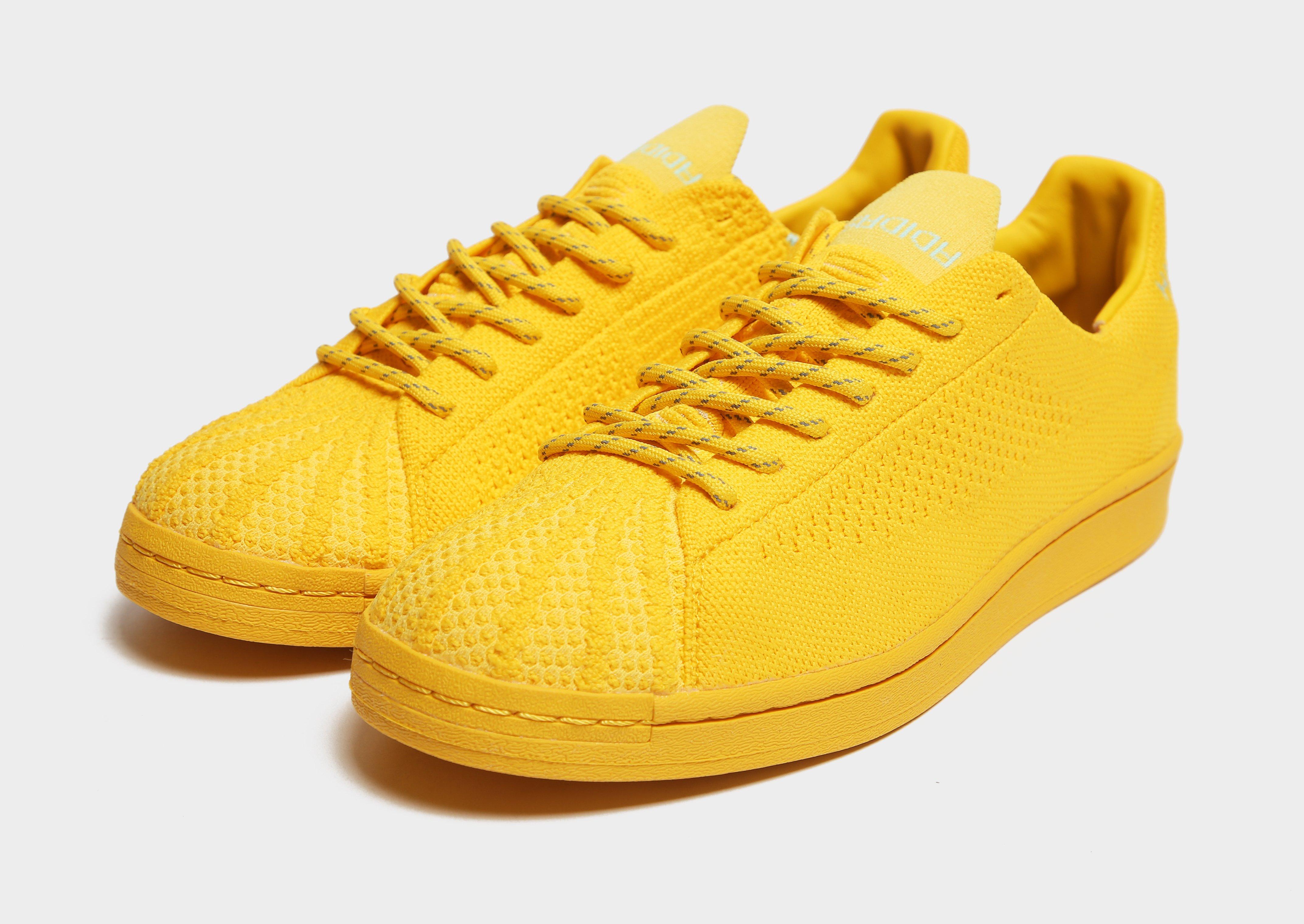 superstar primeknit yellow