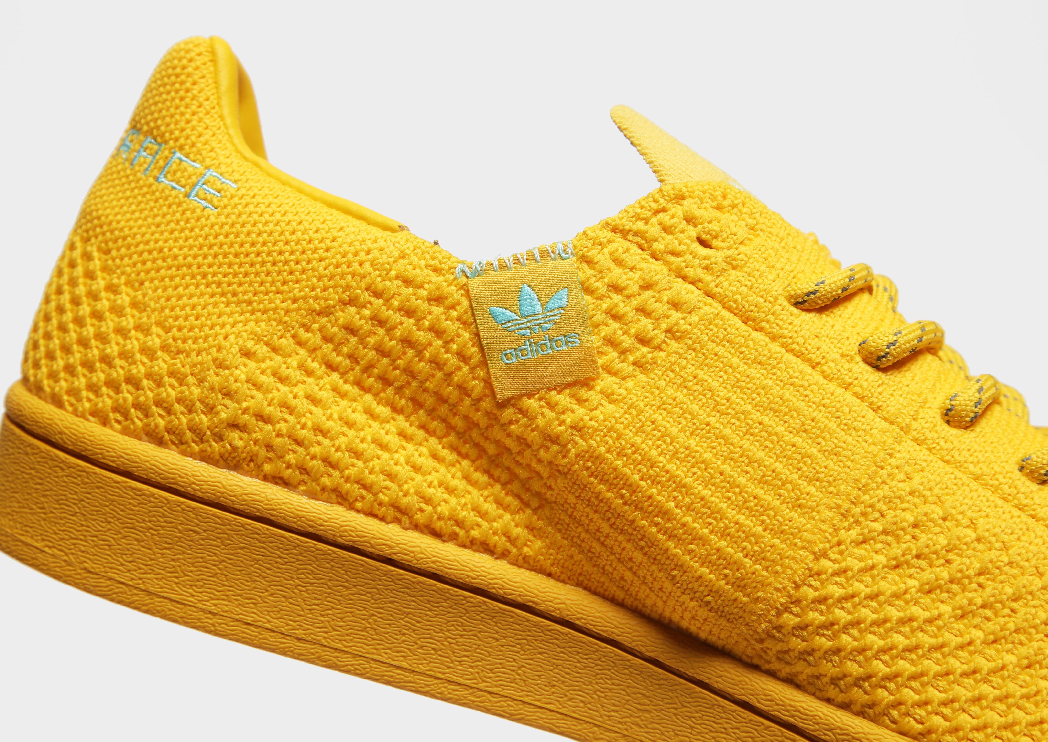 superstar primeknit yellow