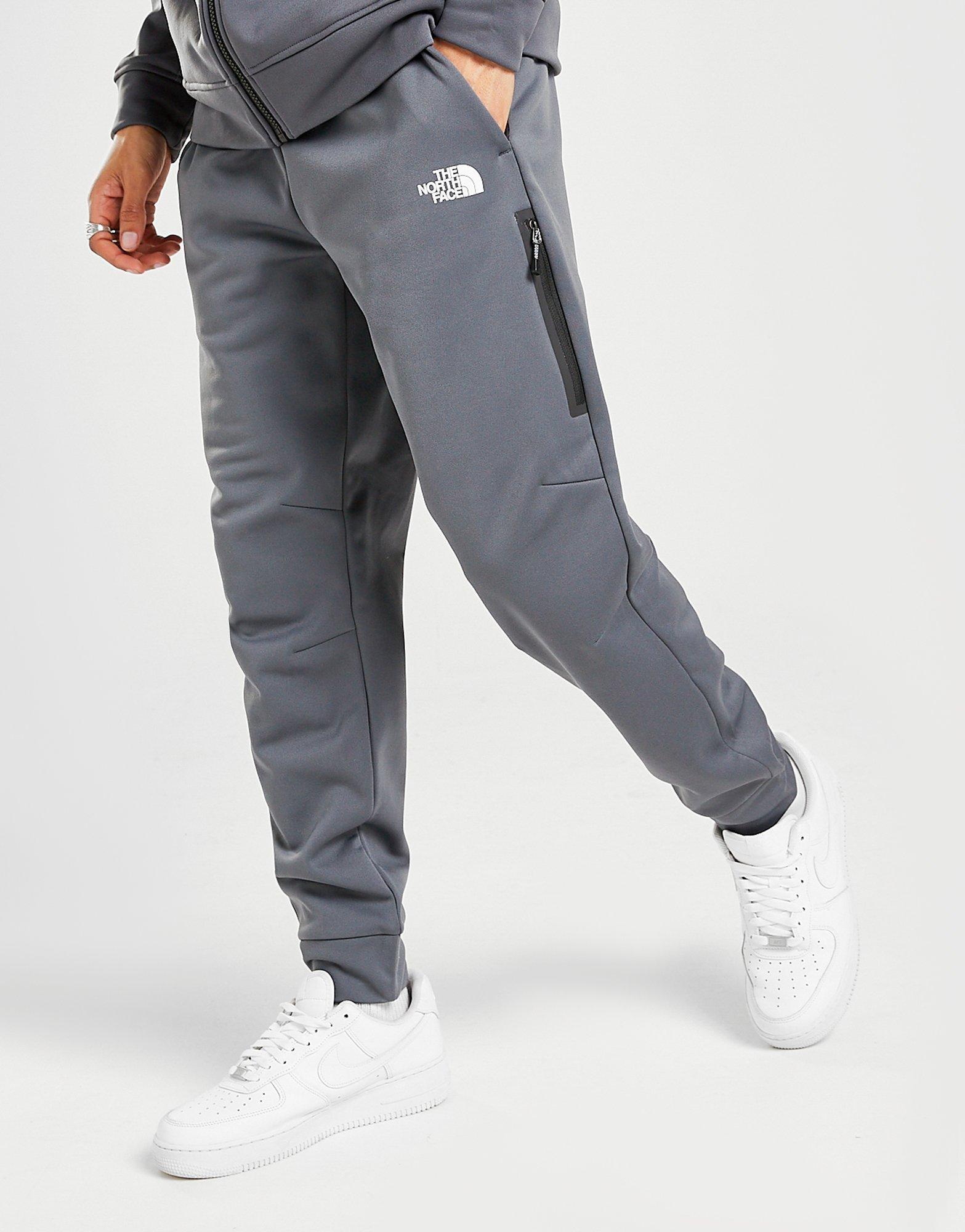 grey north face trackies