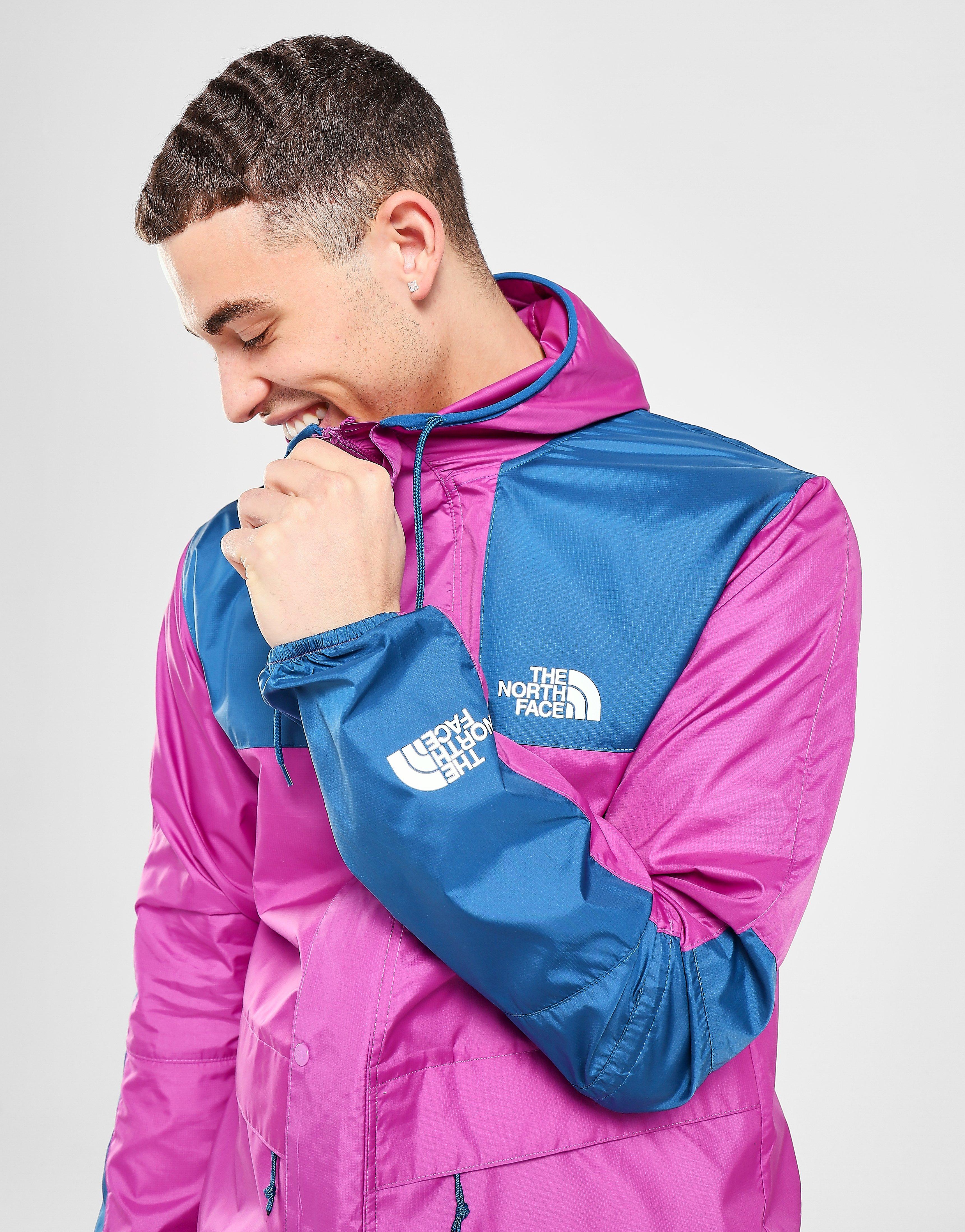 purple and blue north face jacket
