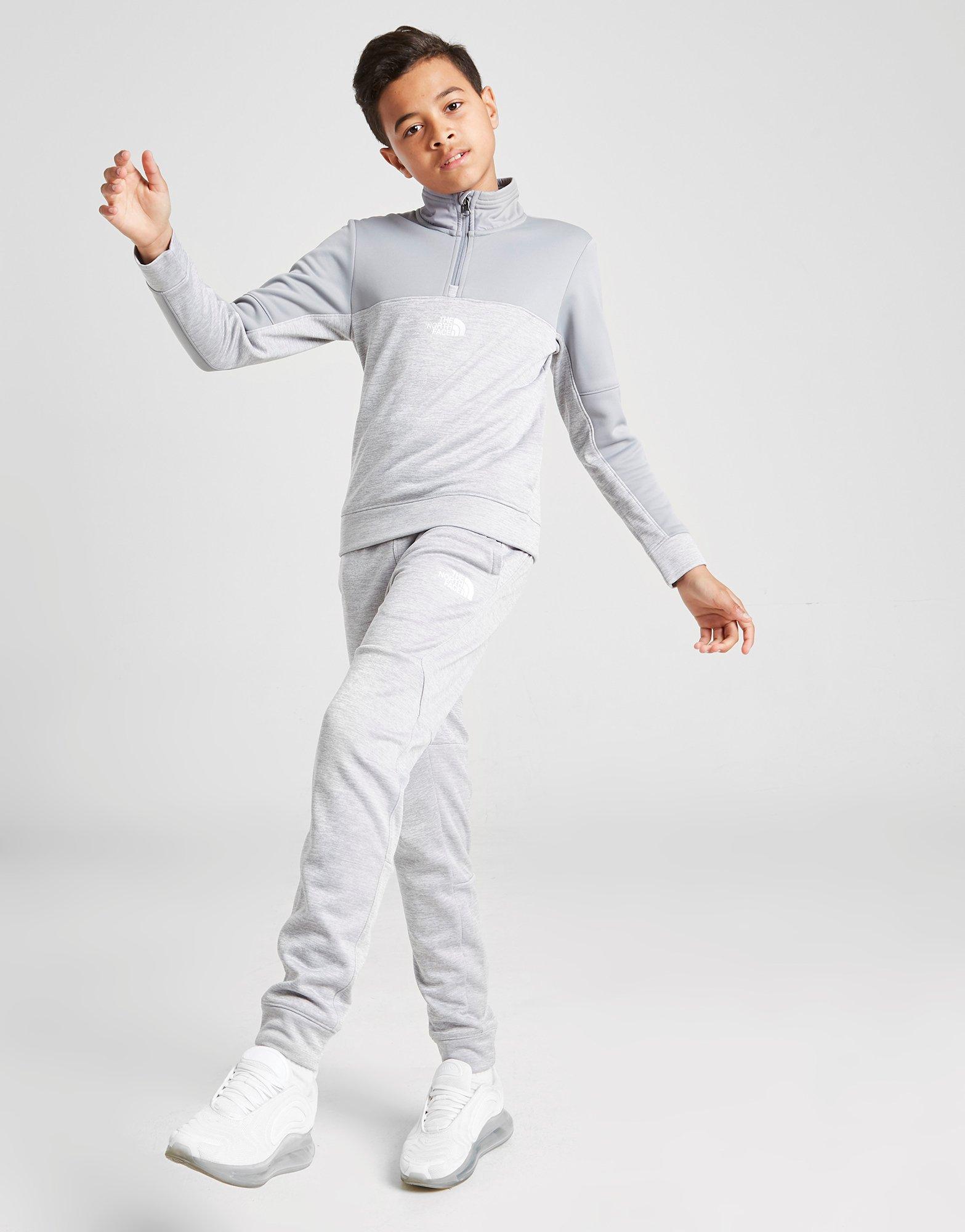 grey north face trackies