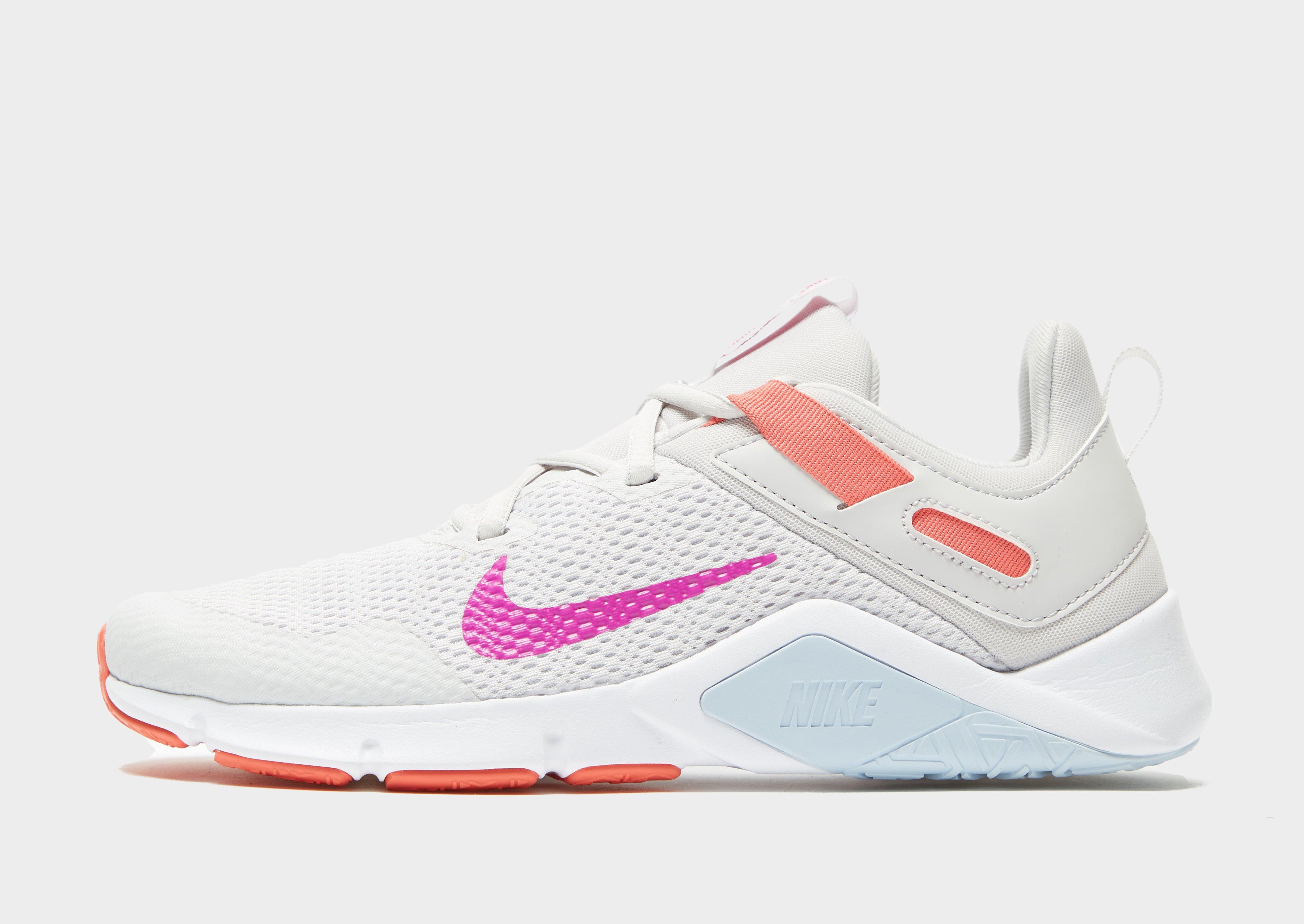 nike pink legend trainers