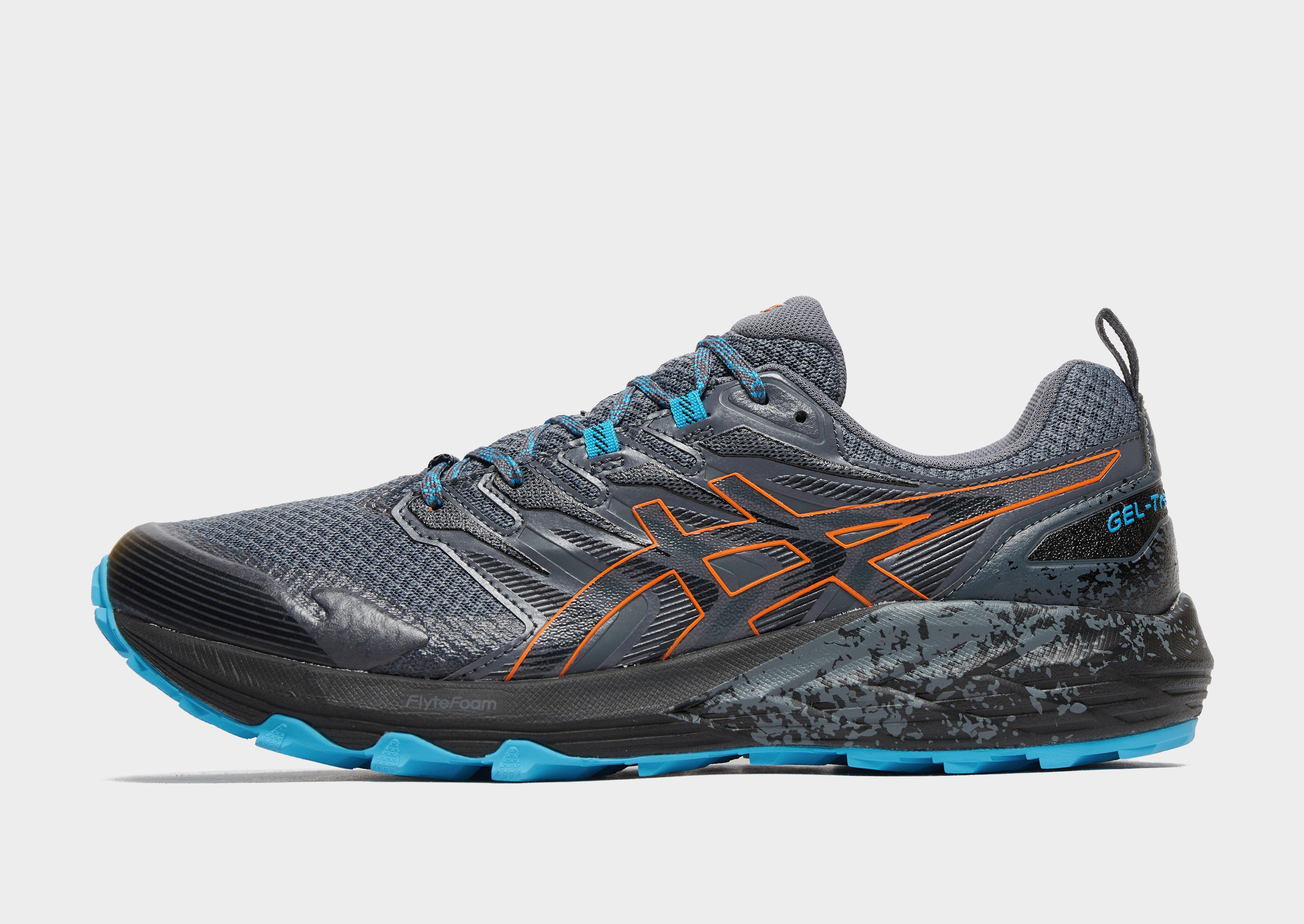 asics grey and orange trainers