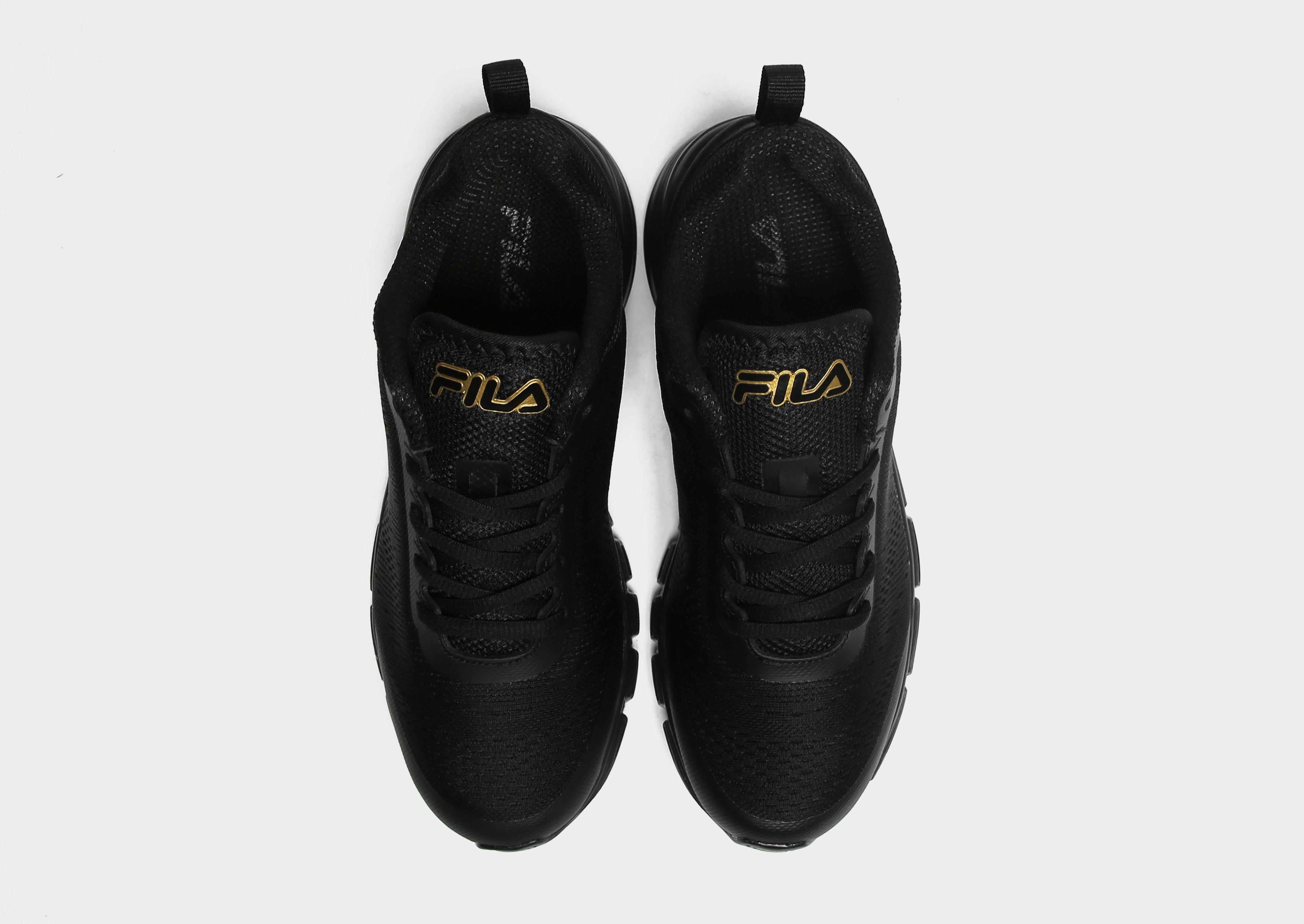 fila trainers black and gold