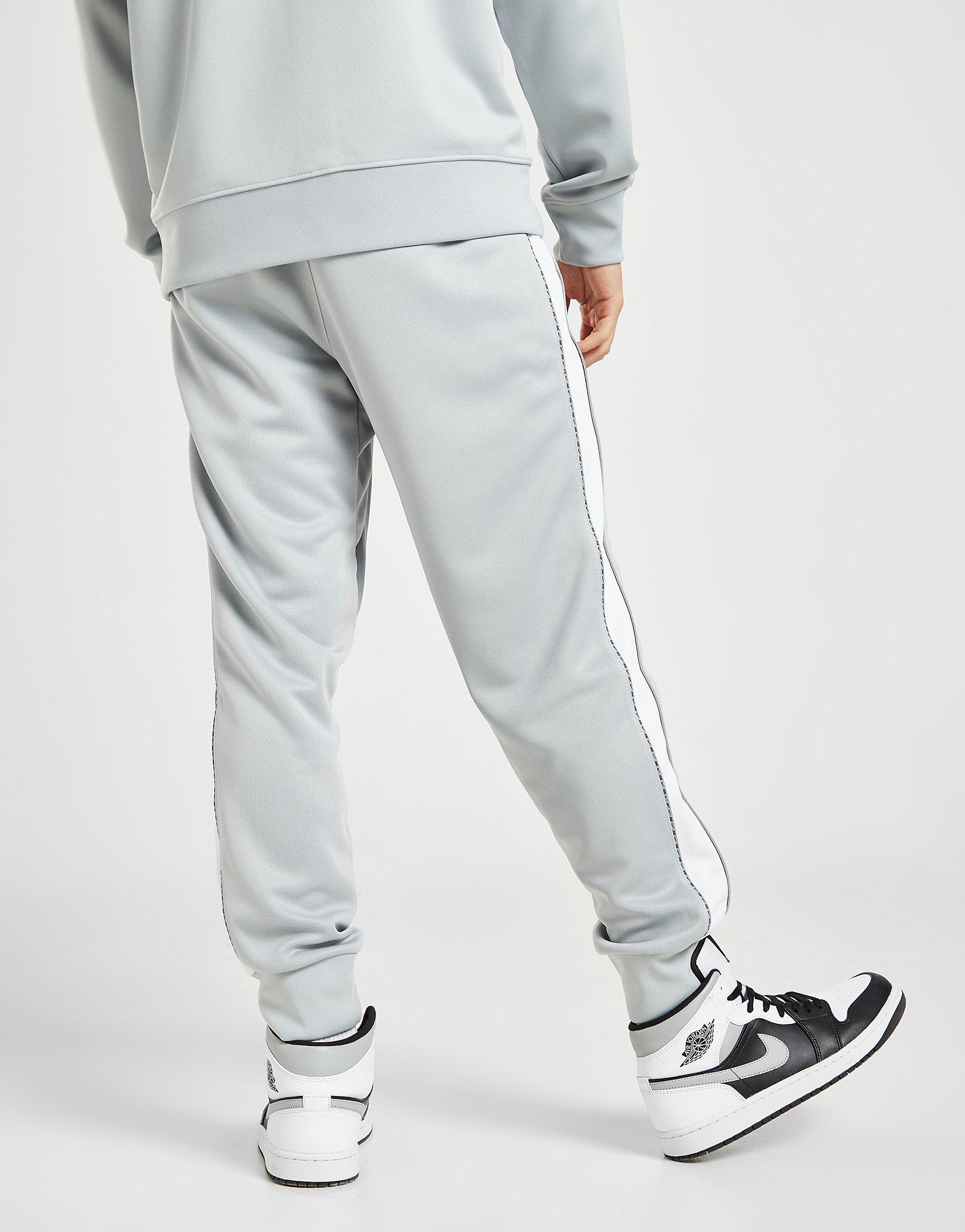 nike repeat tracksuit bottoms