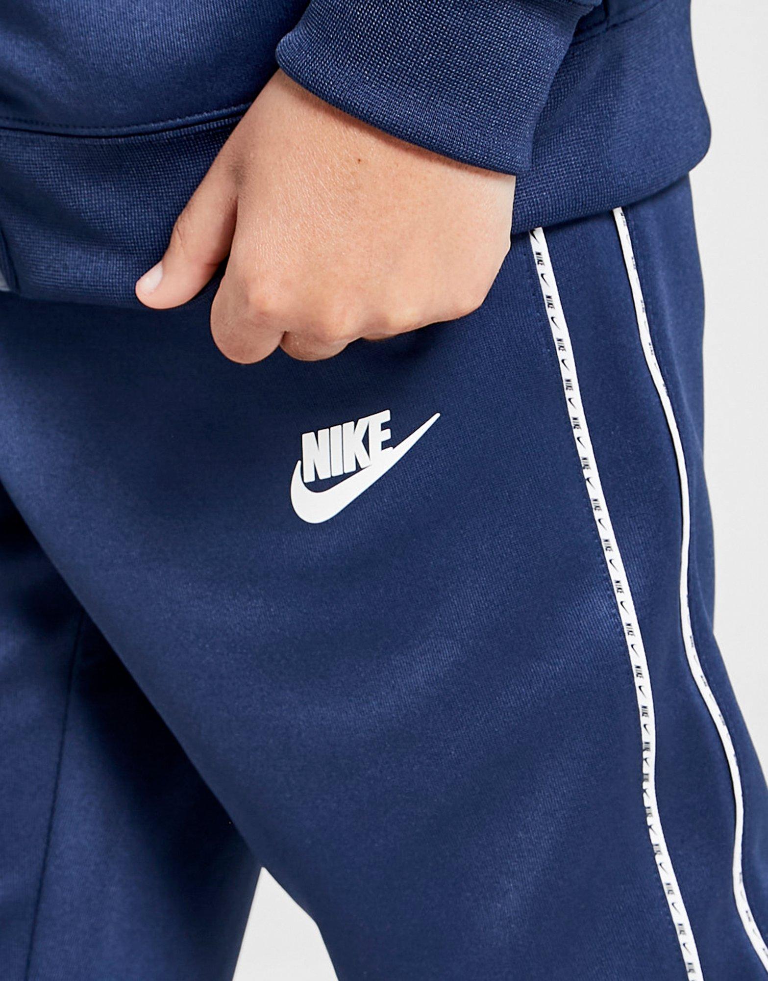 nike tape poly track pants junior