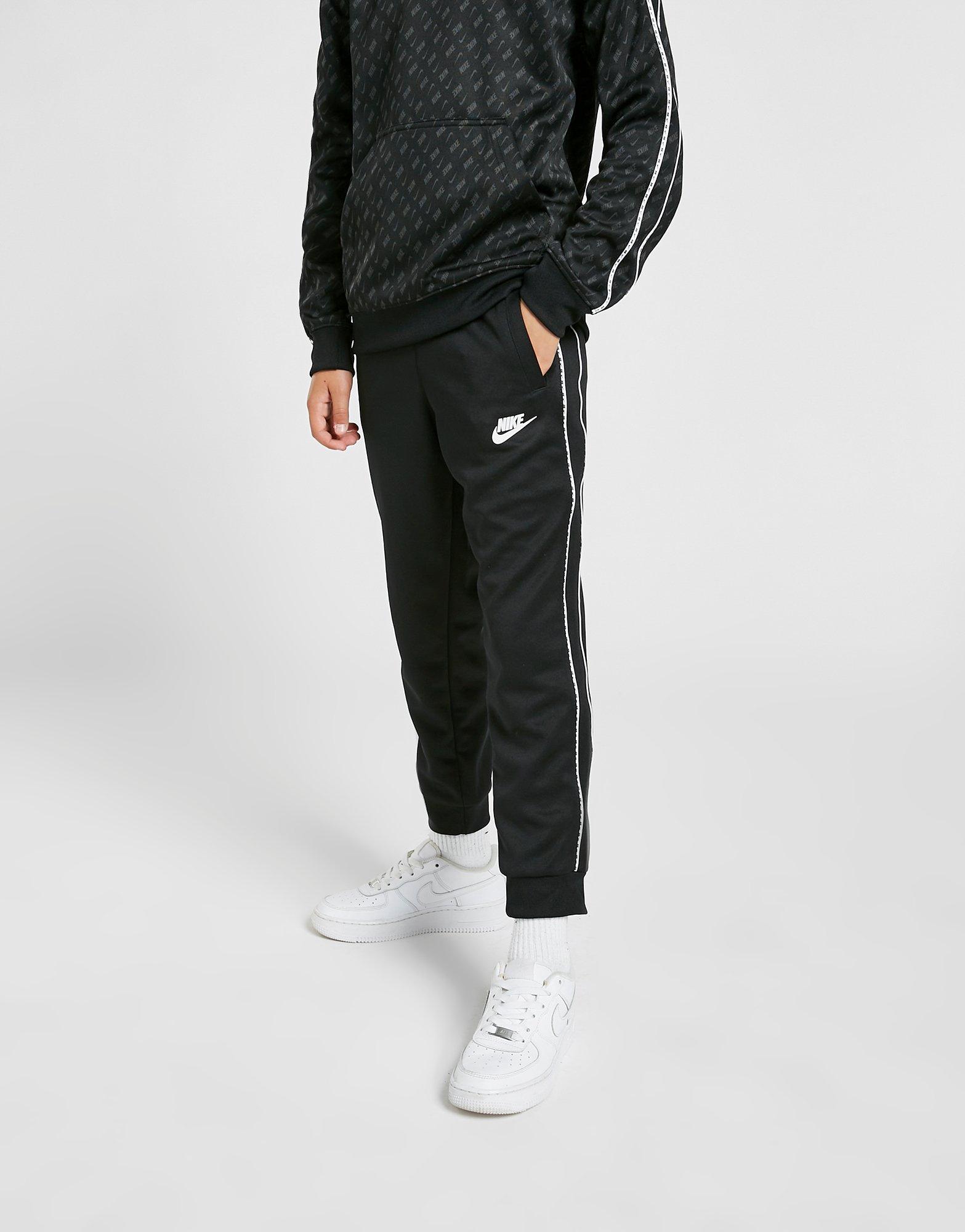 nike tape poly track pants junior