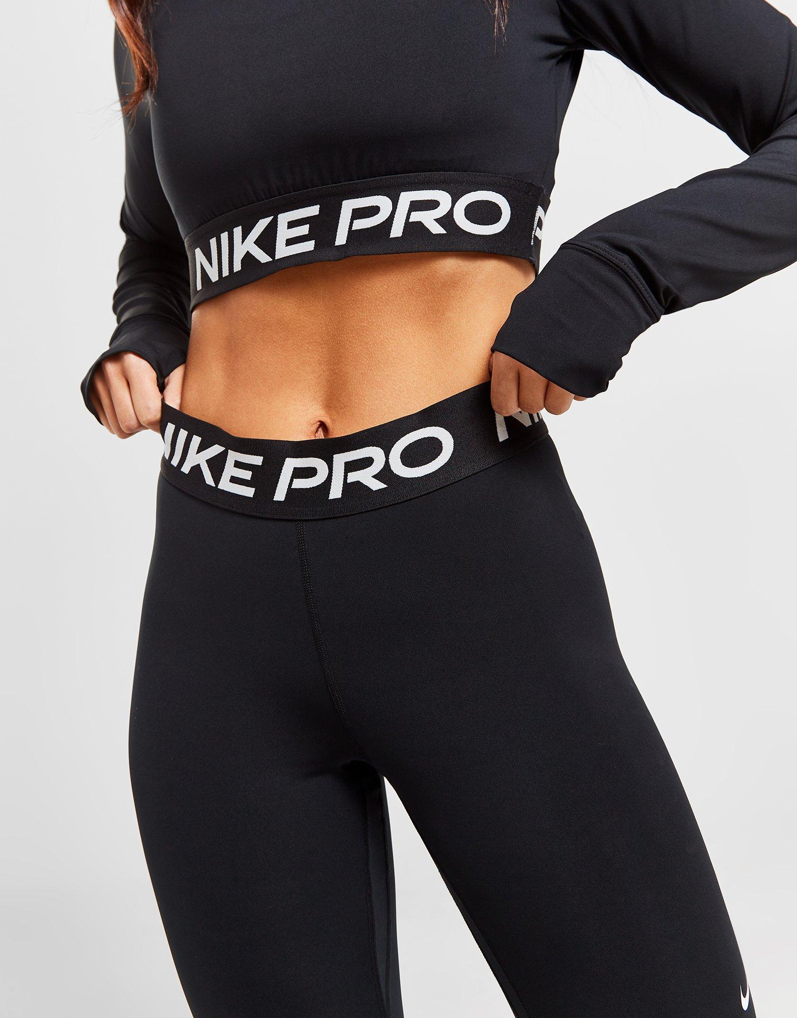 Nike – Pro Training – Kurz geschnittene Leggings in Schwarz mit Grafik am  Bund