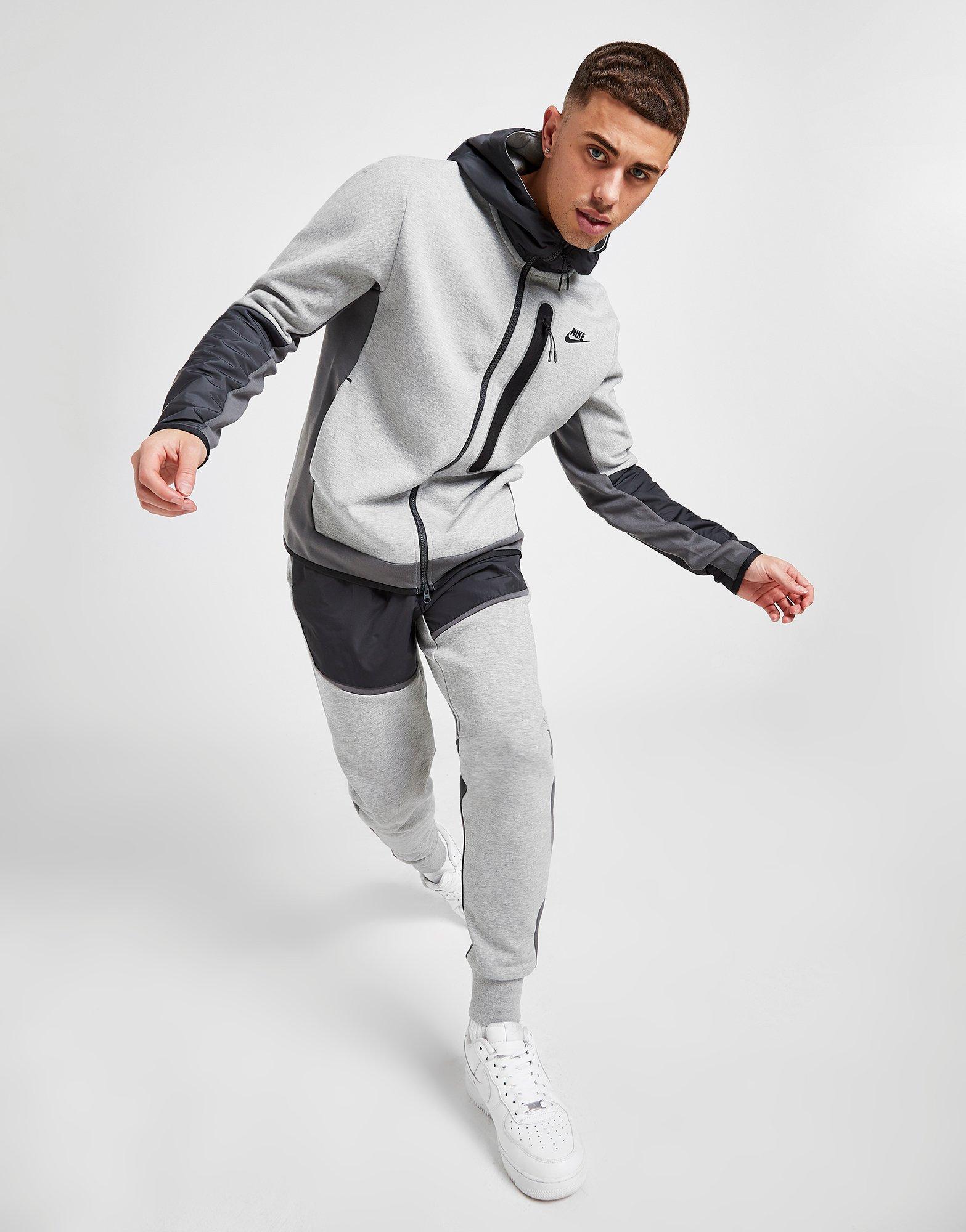 grey nike woven tracksuit