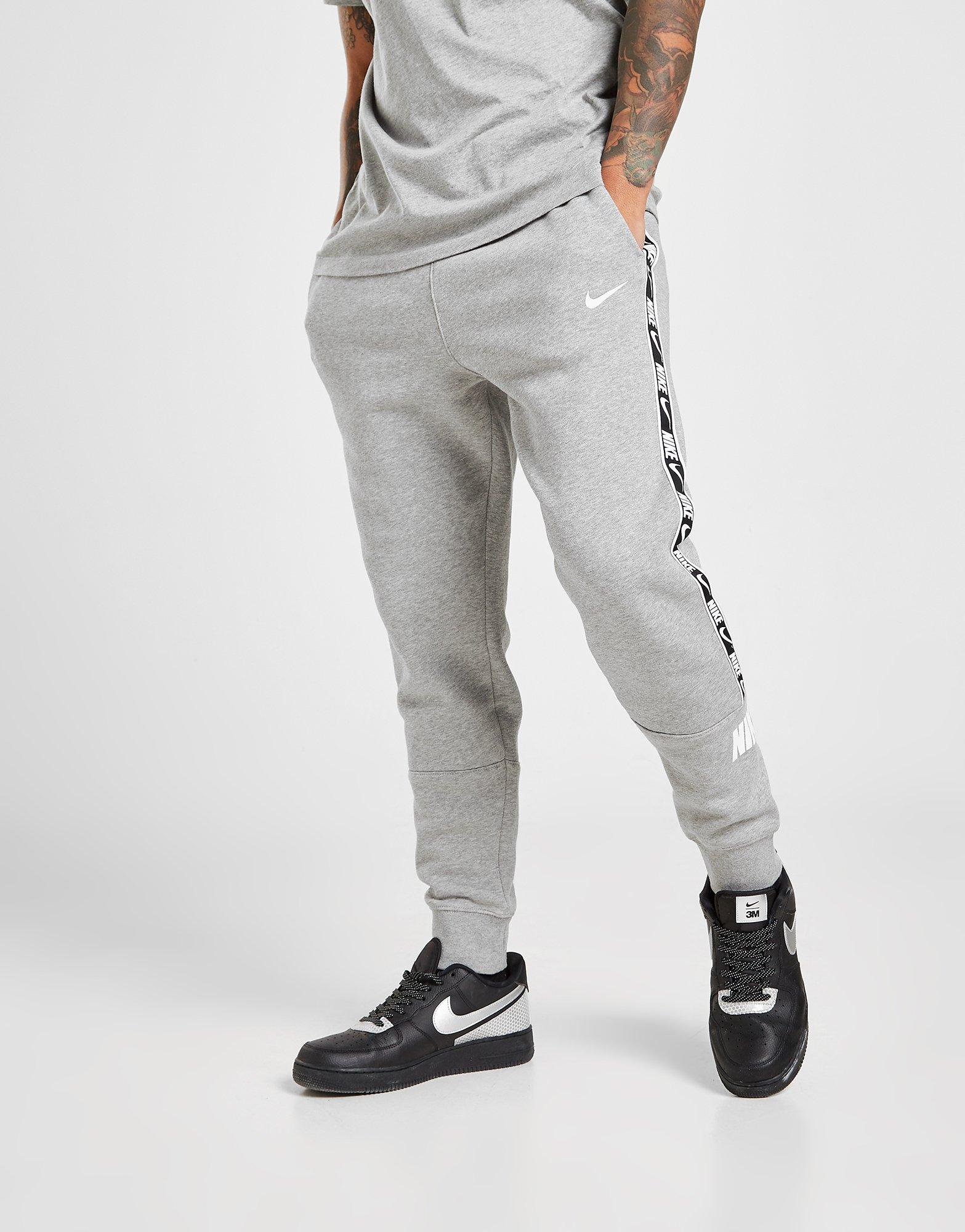 nike repeat tape tracksuit grey