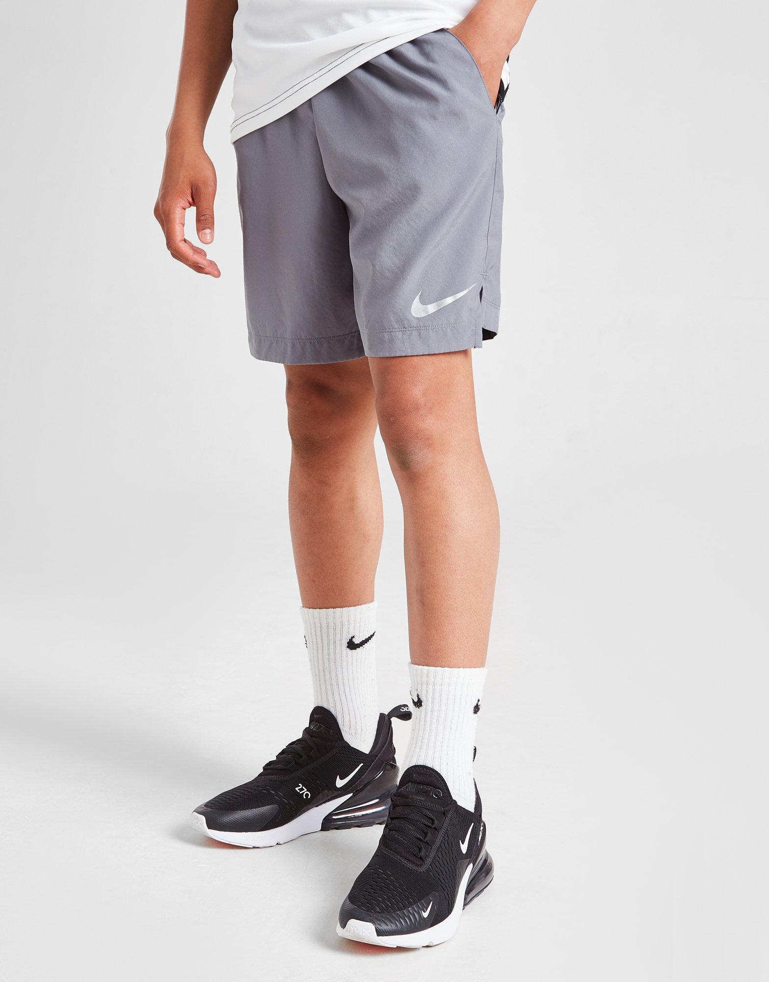 grey nike shorts junior