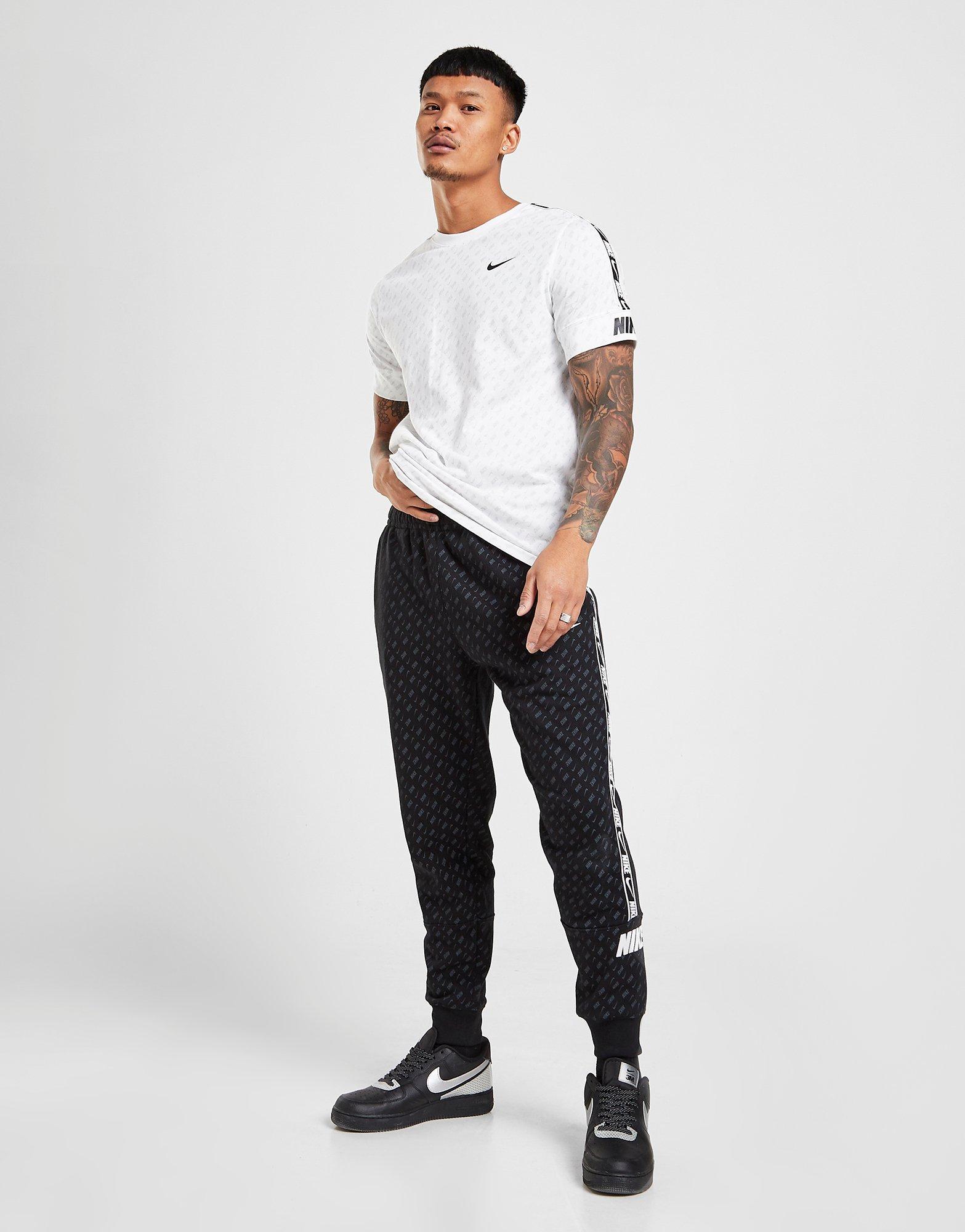 nike all over print sweatpants