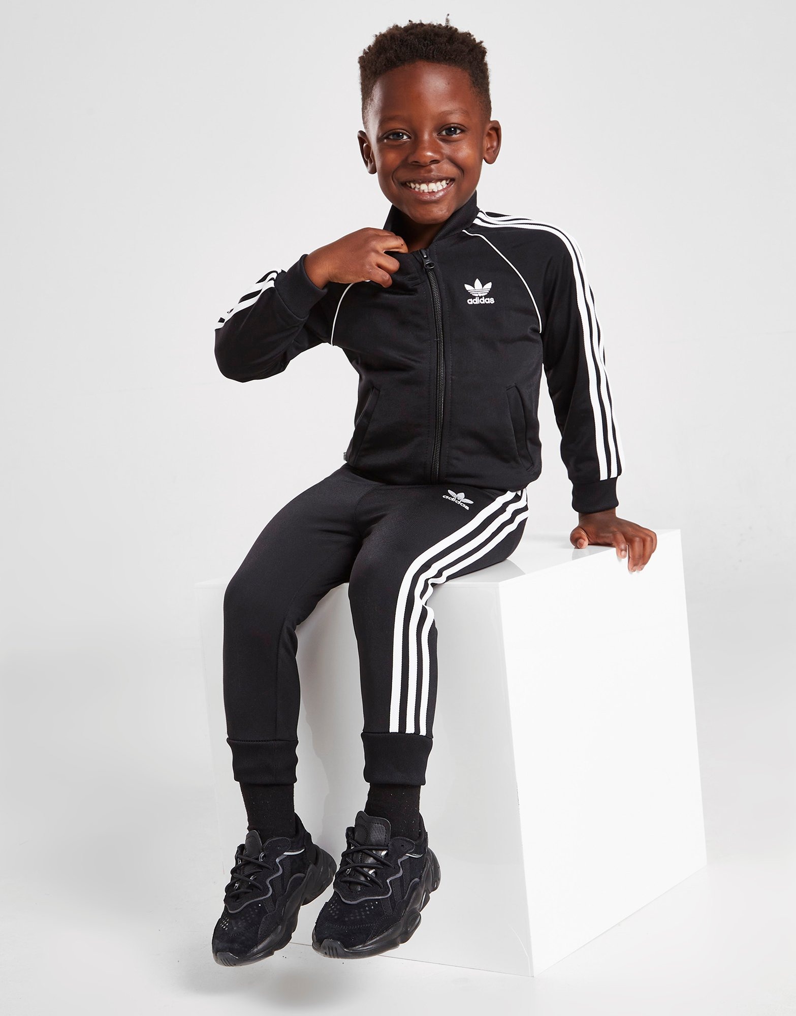 Childrens black hot sale adidas tracksuit