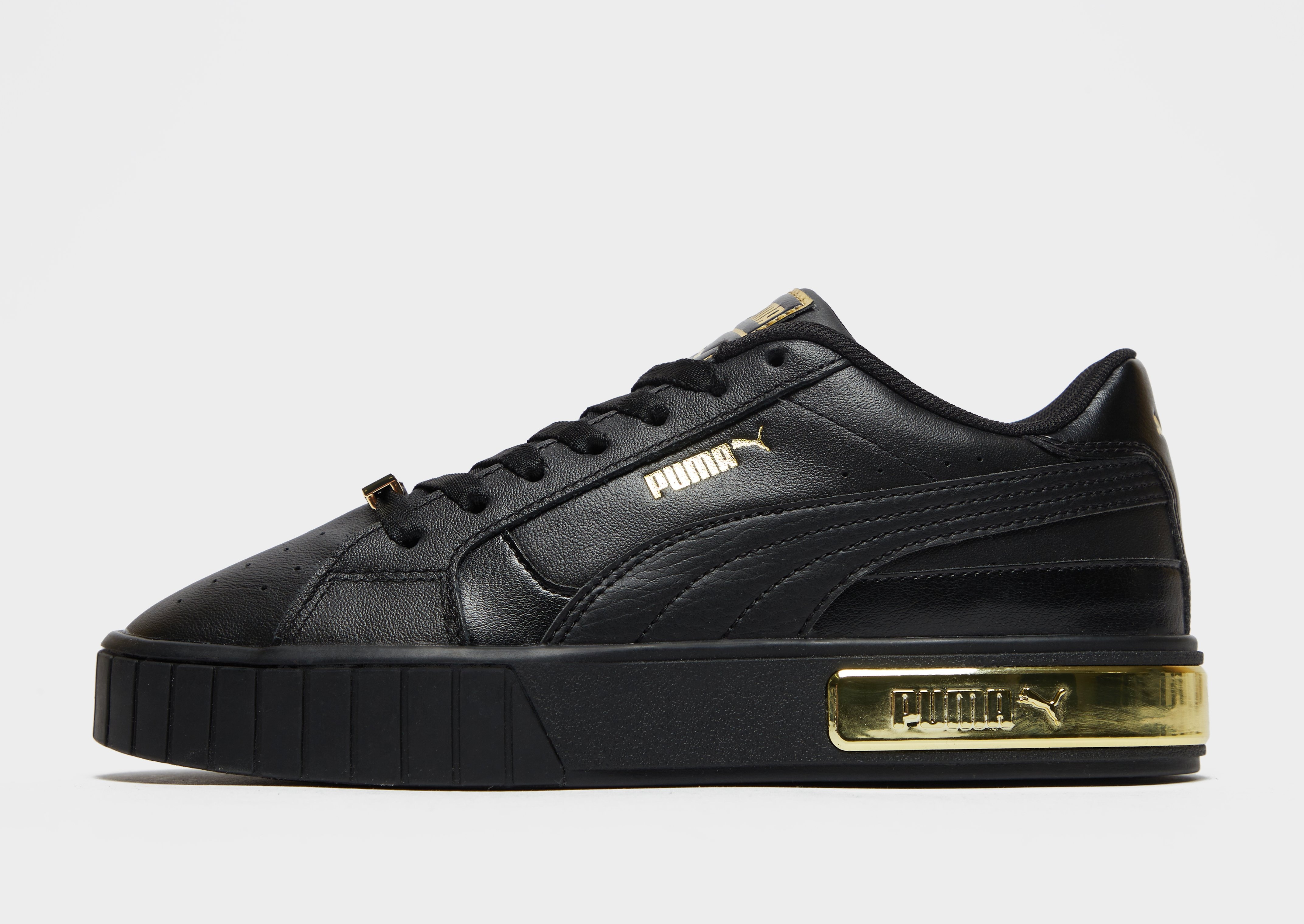 black and gold pumas japan