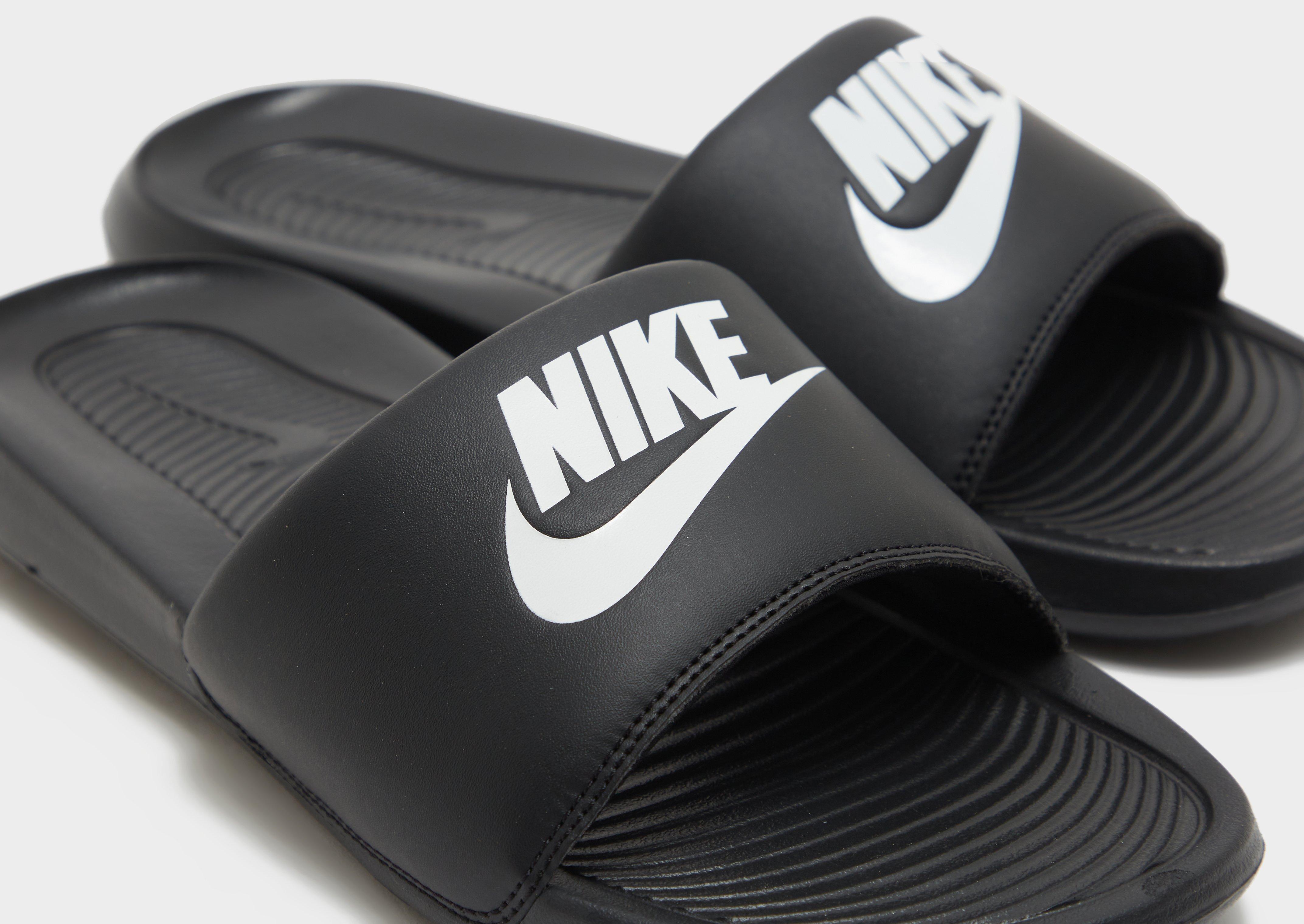 Nike slides outlet city beach