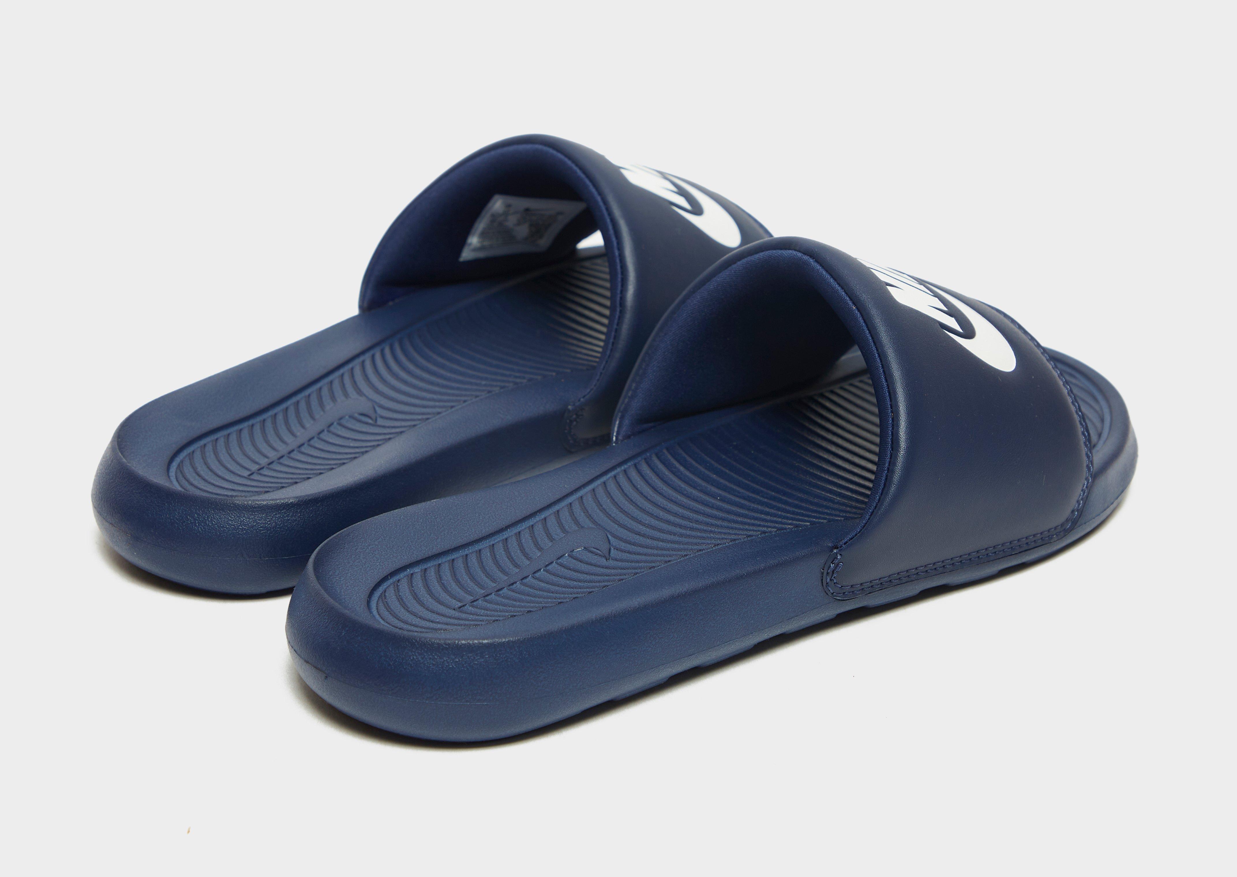 Old school nike slides best sale