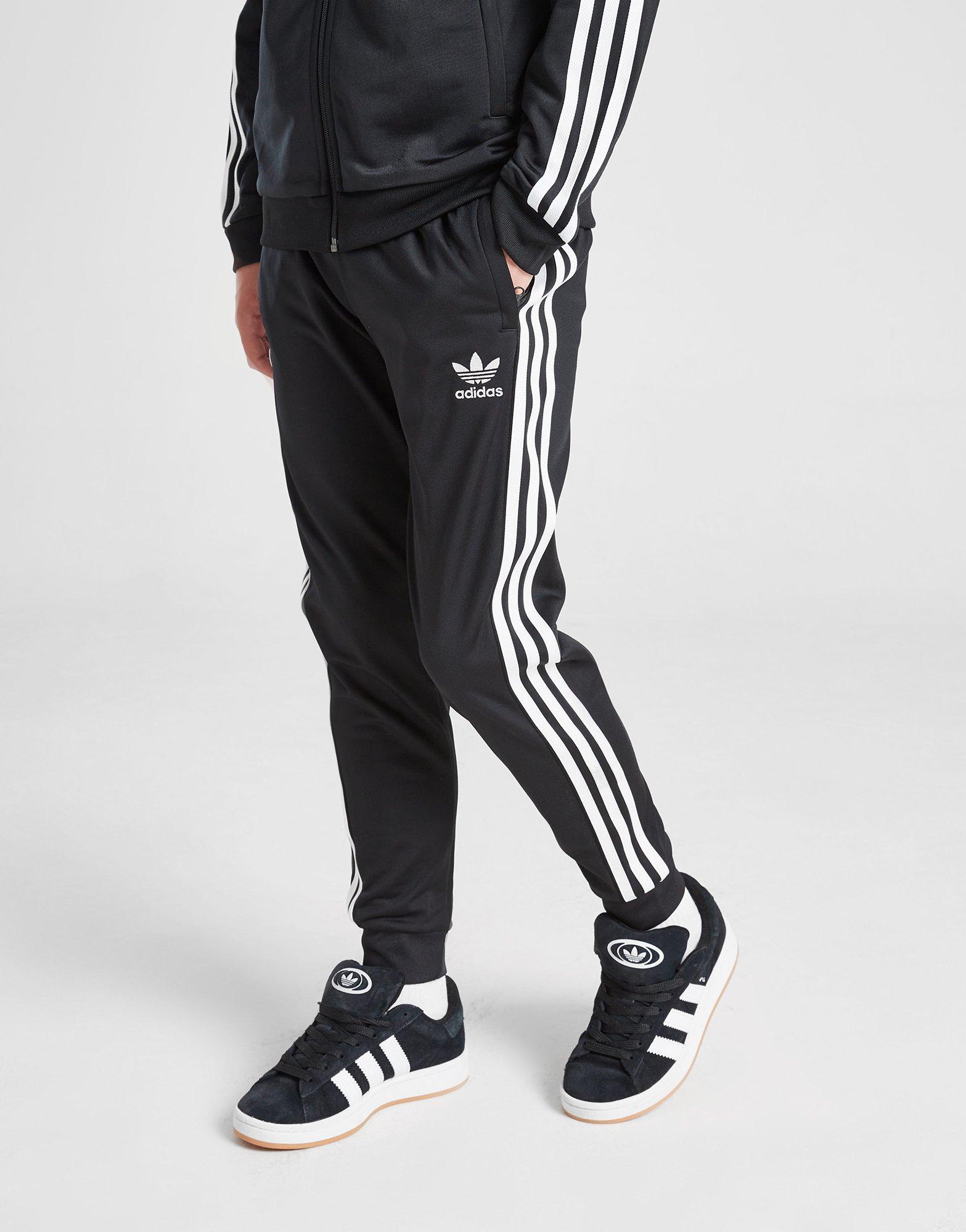 PANTALÓN DE CHANDAL ADIDAS CON PUÑO JUNIOR, NEGRO