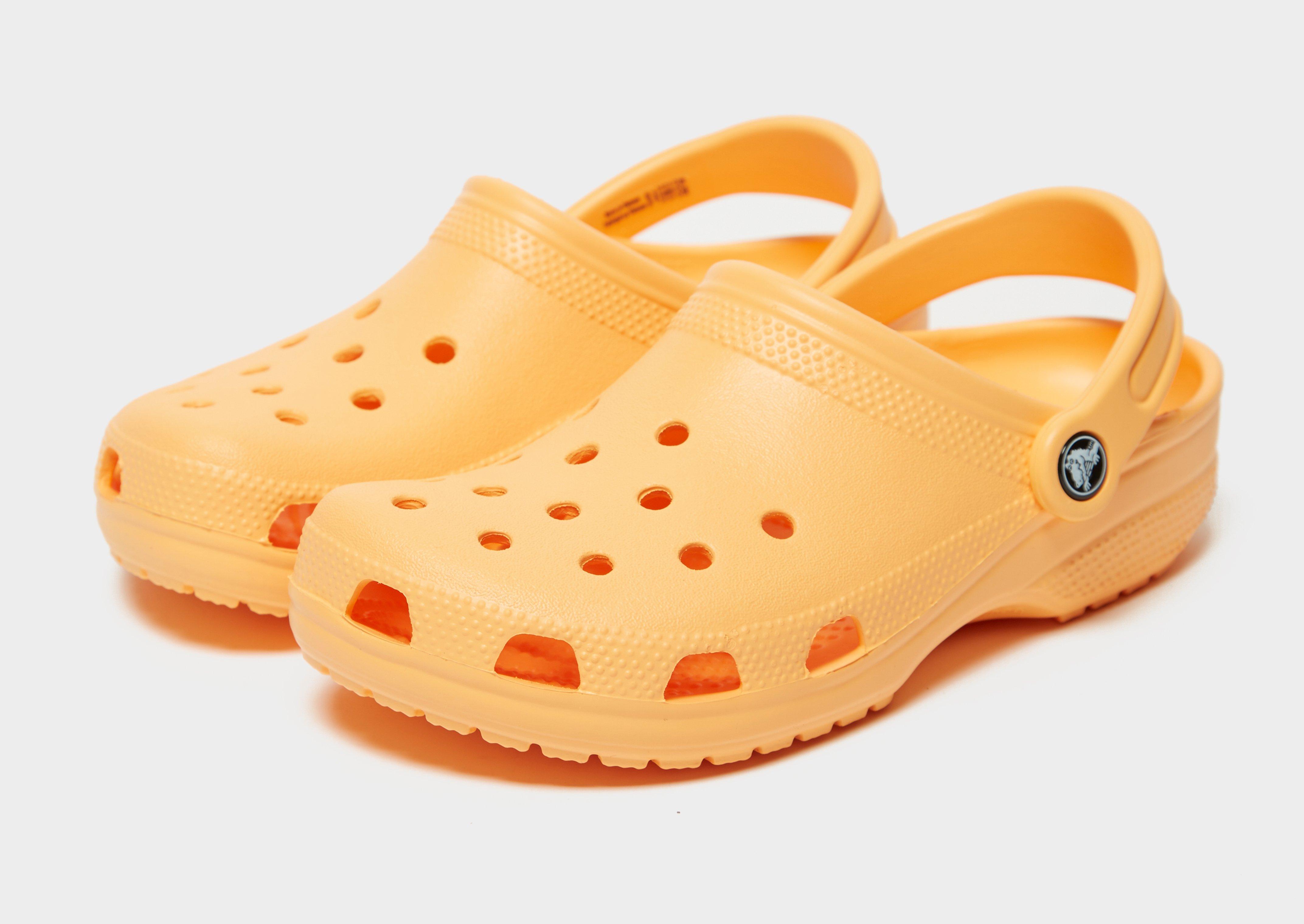 pastel orange crocs