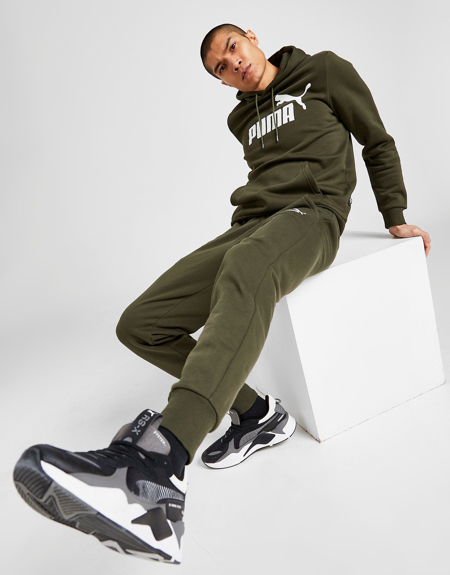 Puma store joggers green