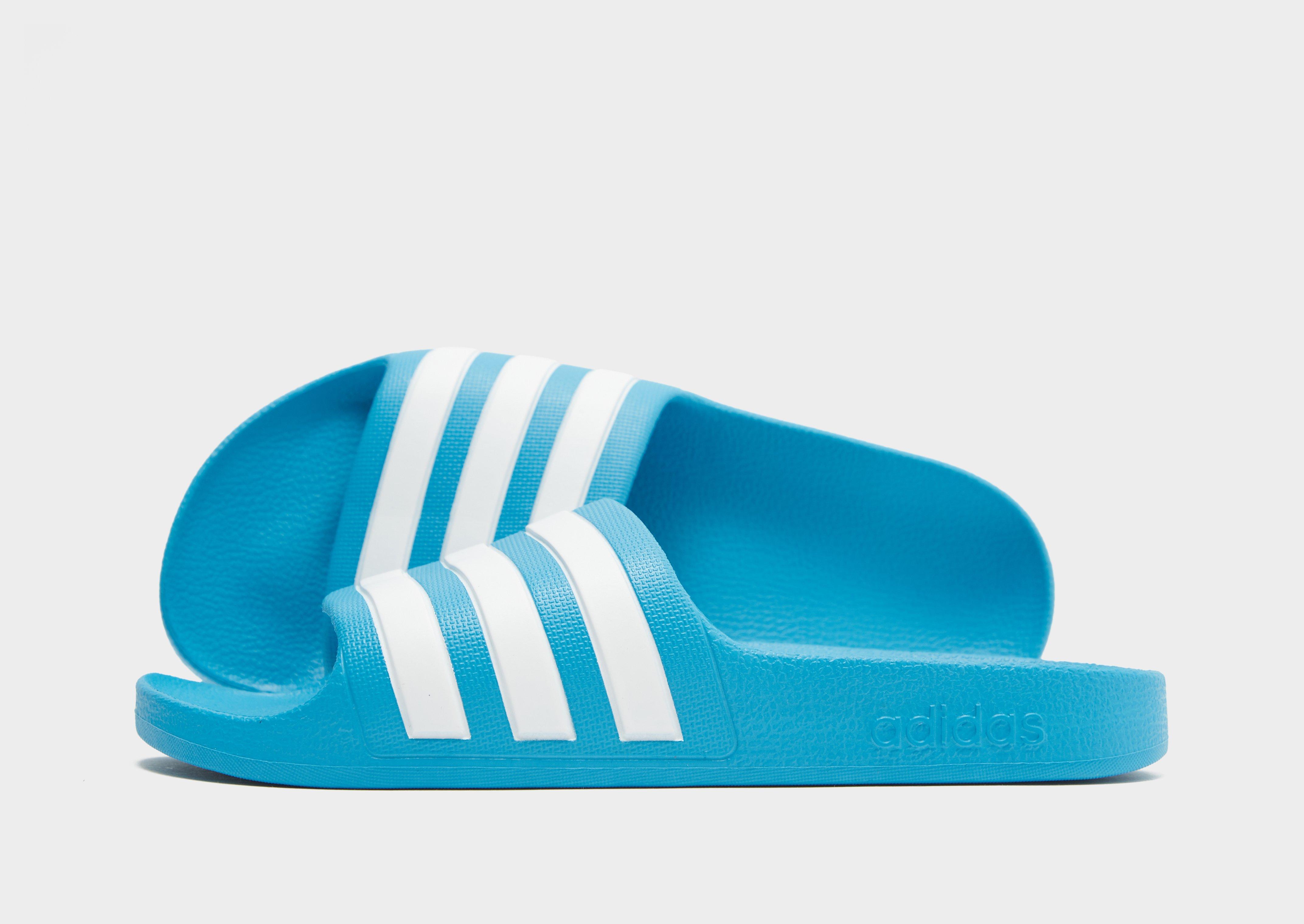 Blue adidas best sale slides women's