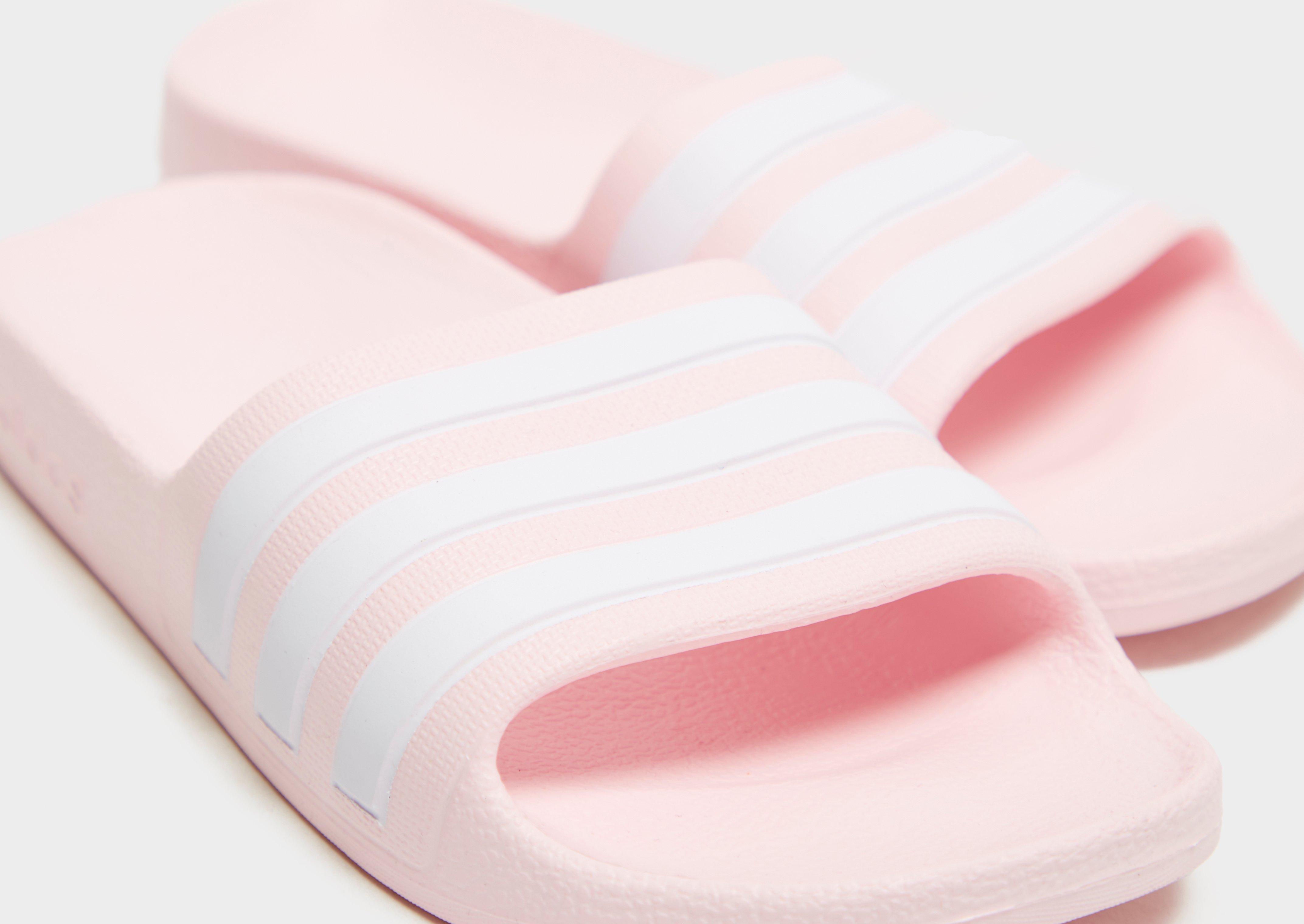 Baby pink hotsell adidas slides