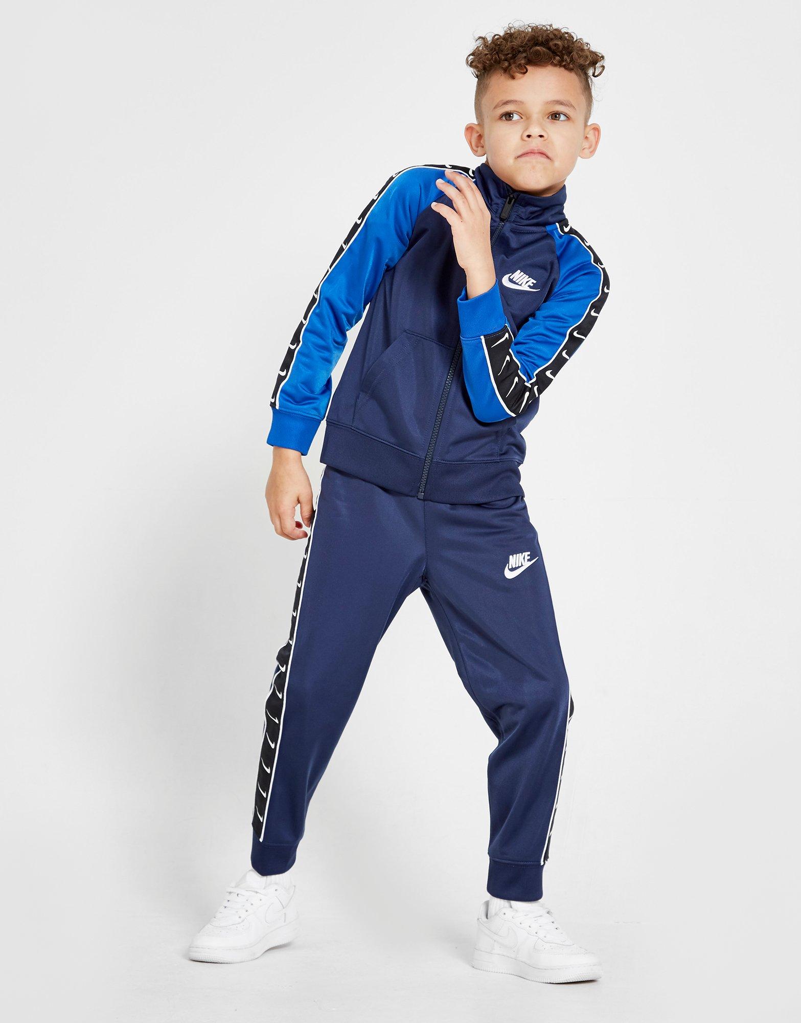 nike swoosh taped tracksuit