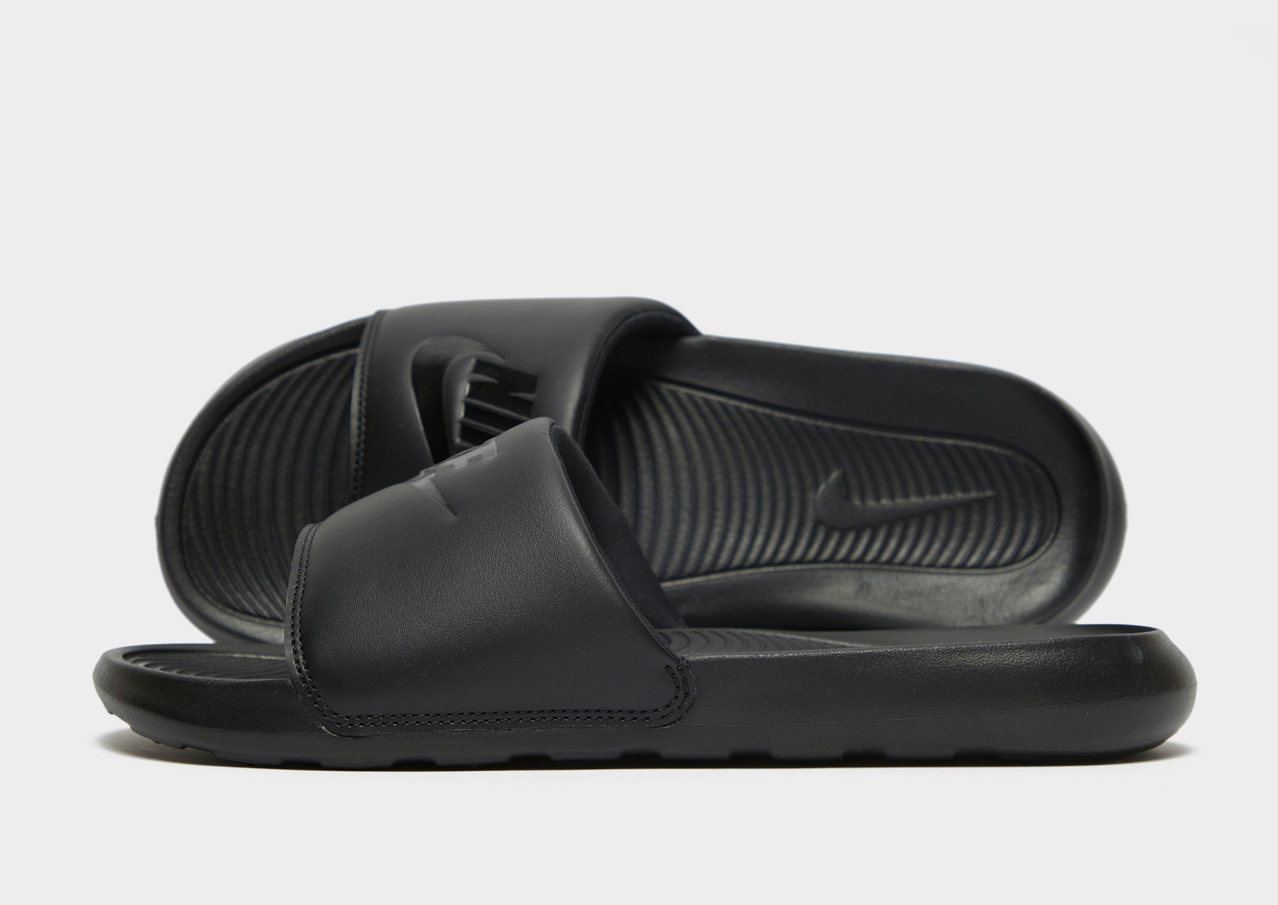 Grey and black nike hot sale slides