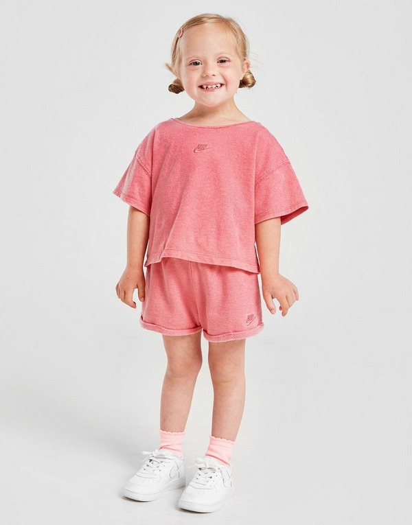 Nike conjunto camiseta/pantalón Washed para bebé en Rosa | JD Sports