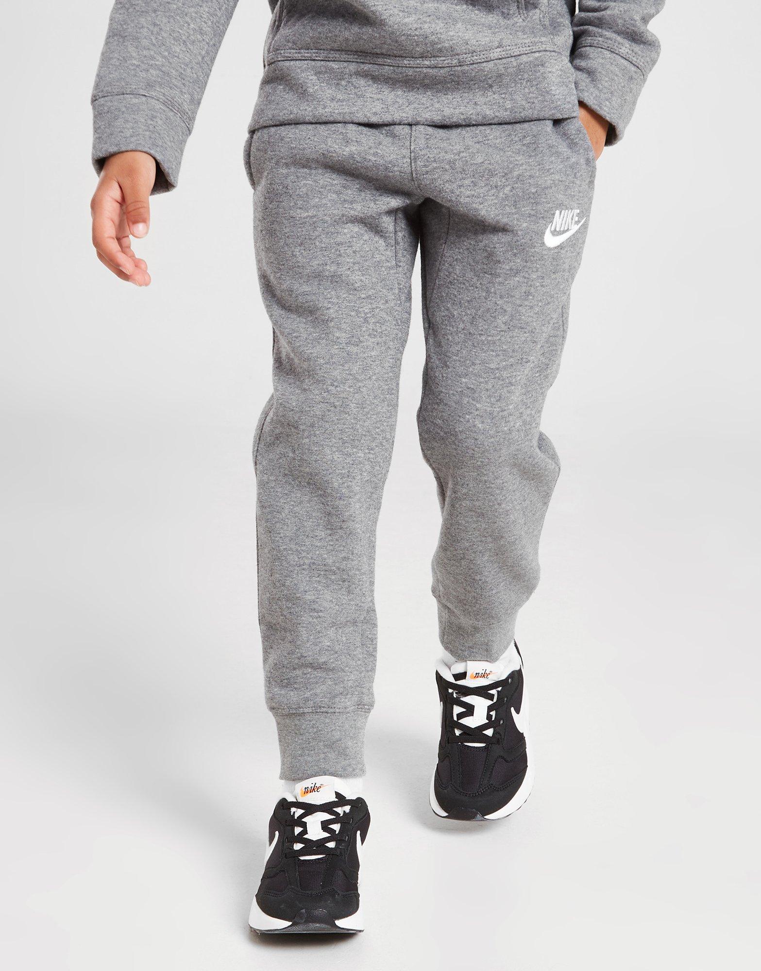 Jogging nike best sale gris junior