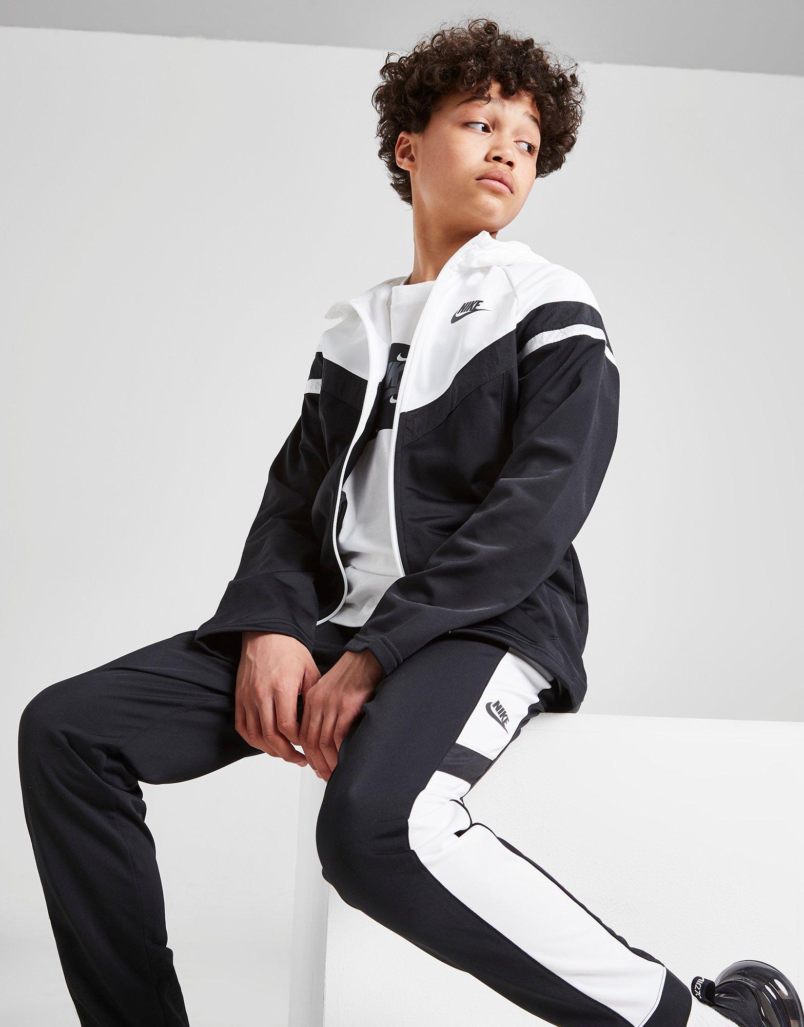 nike woven tracksuit junior