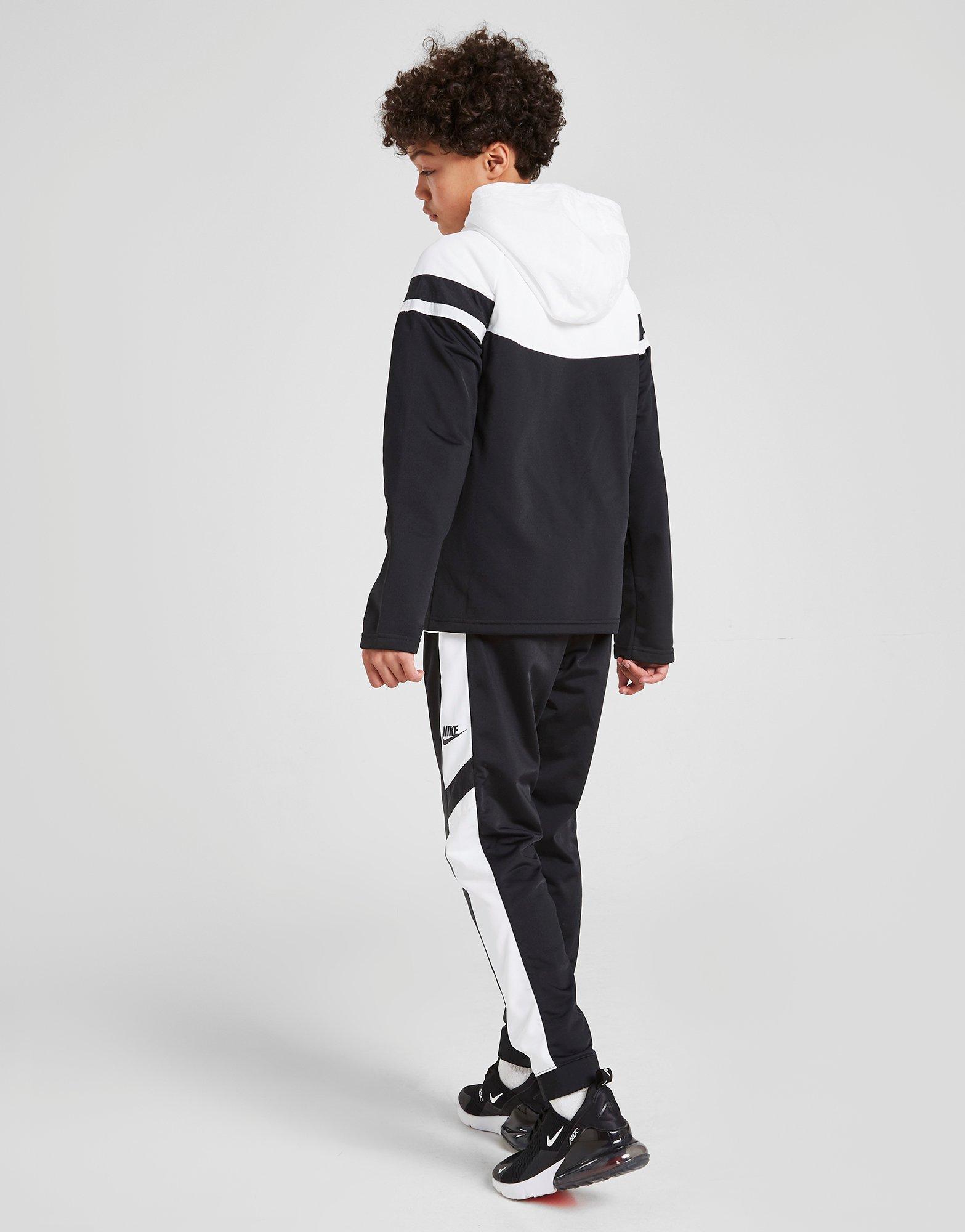 nike woven tracksuit junior