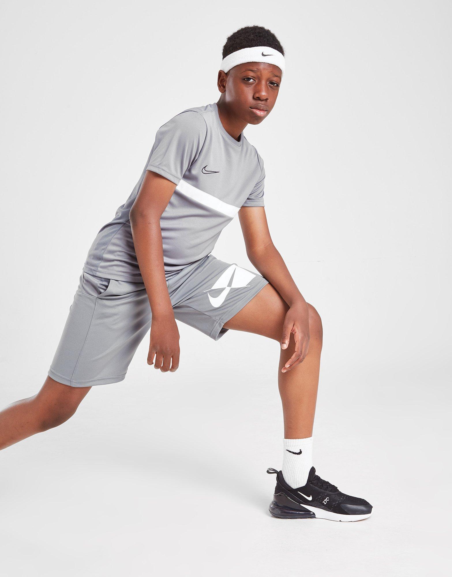 grey nike shorts junior