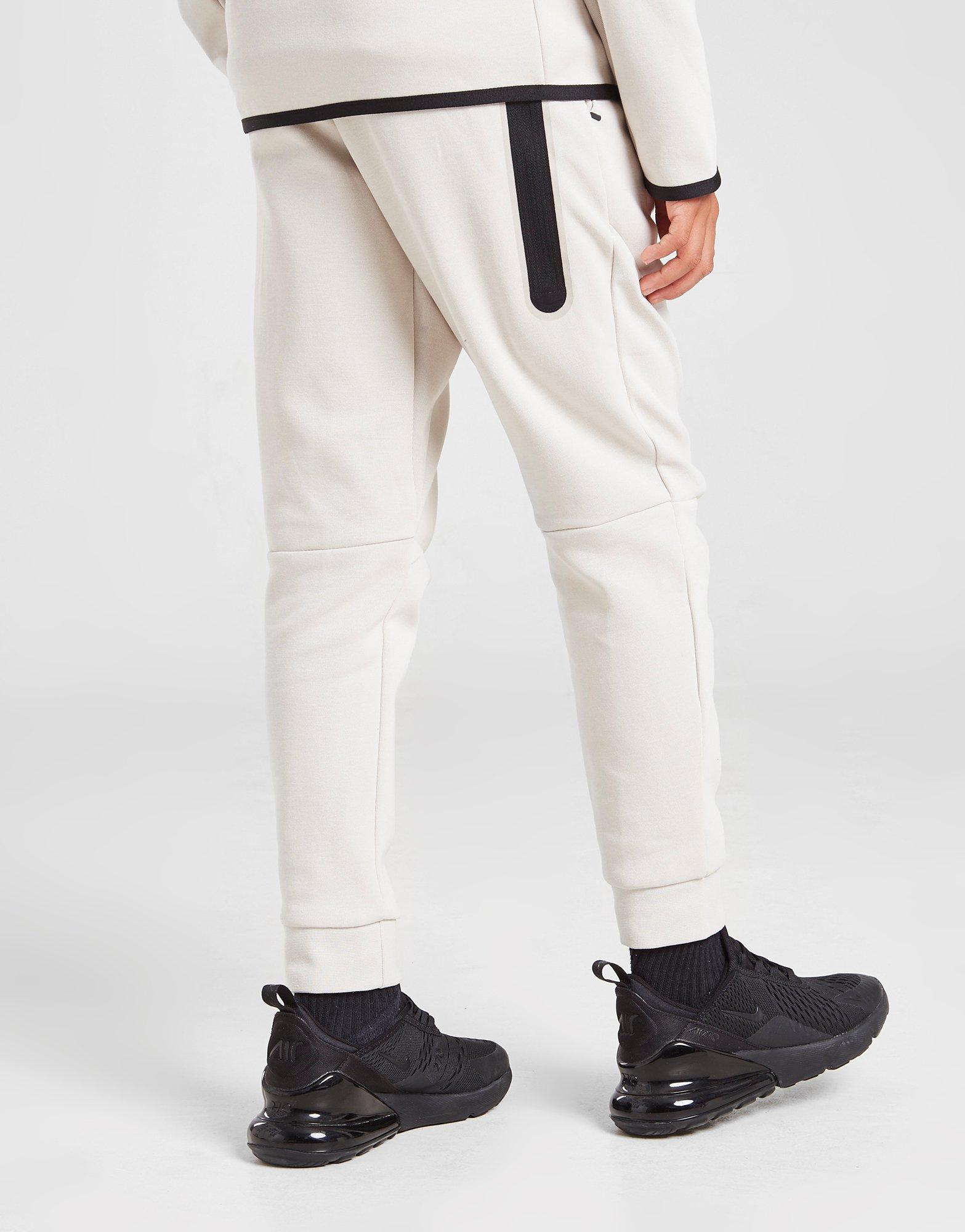 Nike tech pants junior sale