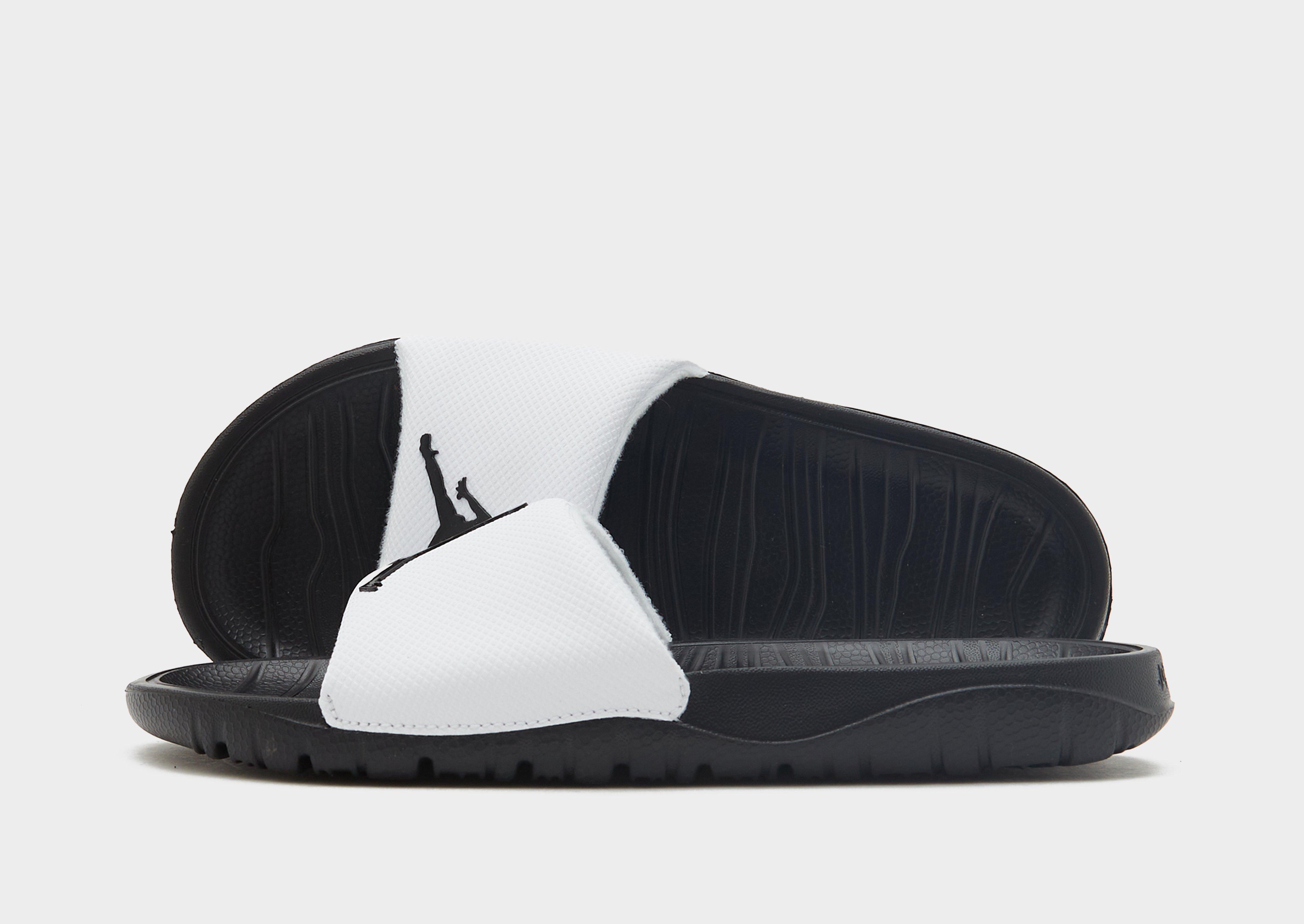 all white jordan slides