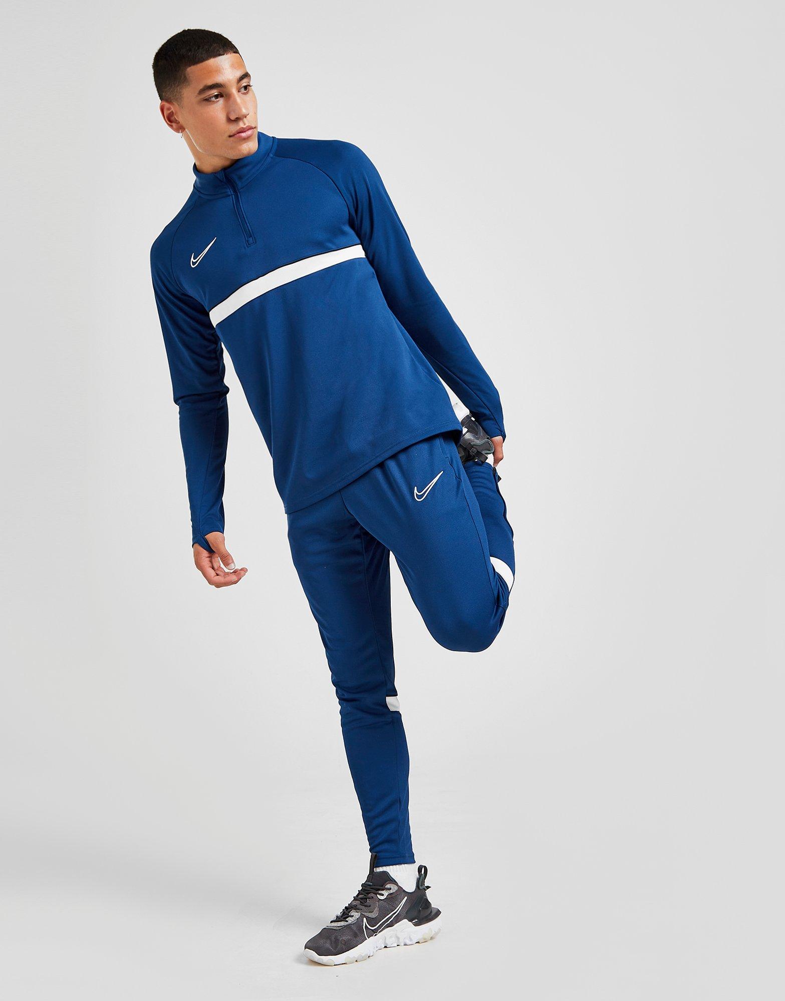 Nike academy track pants blue on sale