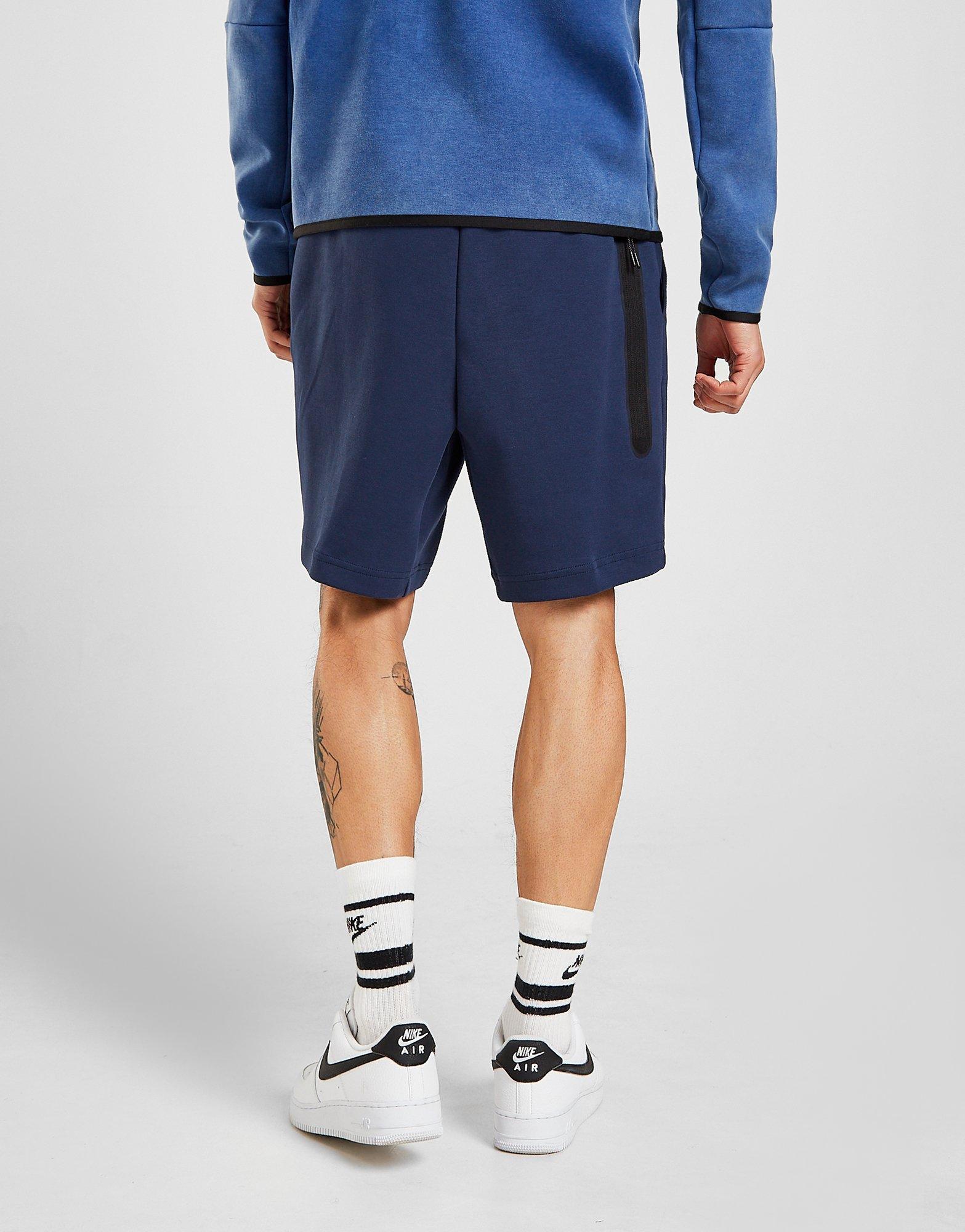 nike tech shorts blue