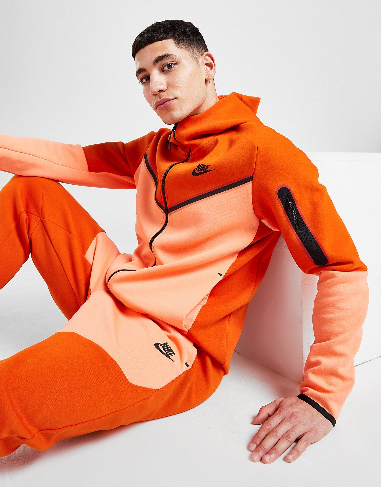 blue and orange nike tracksuit