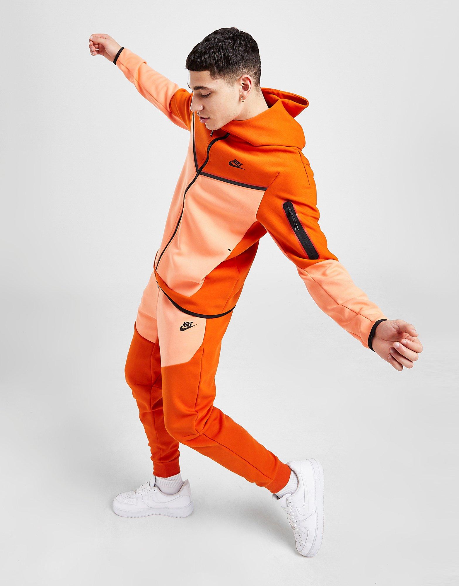 orange nike jumpsuit