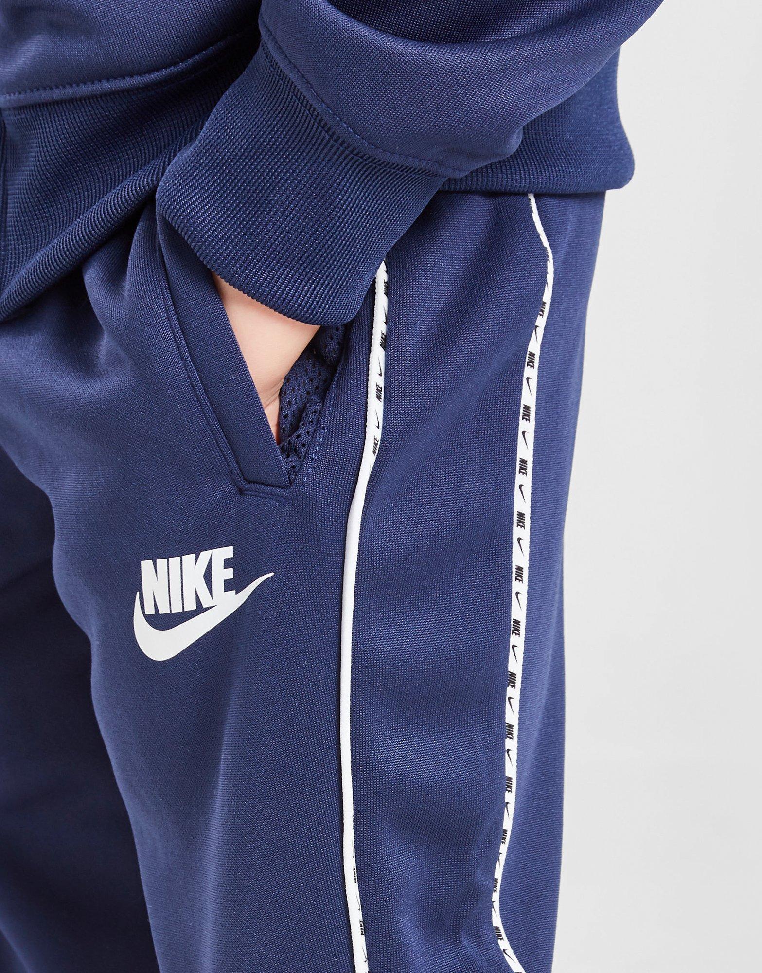 Nike swoosh tracksuit blue clearance