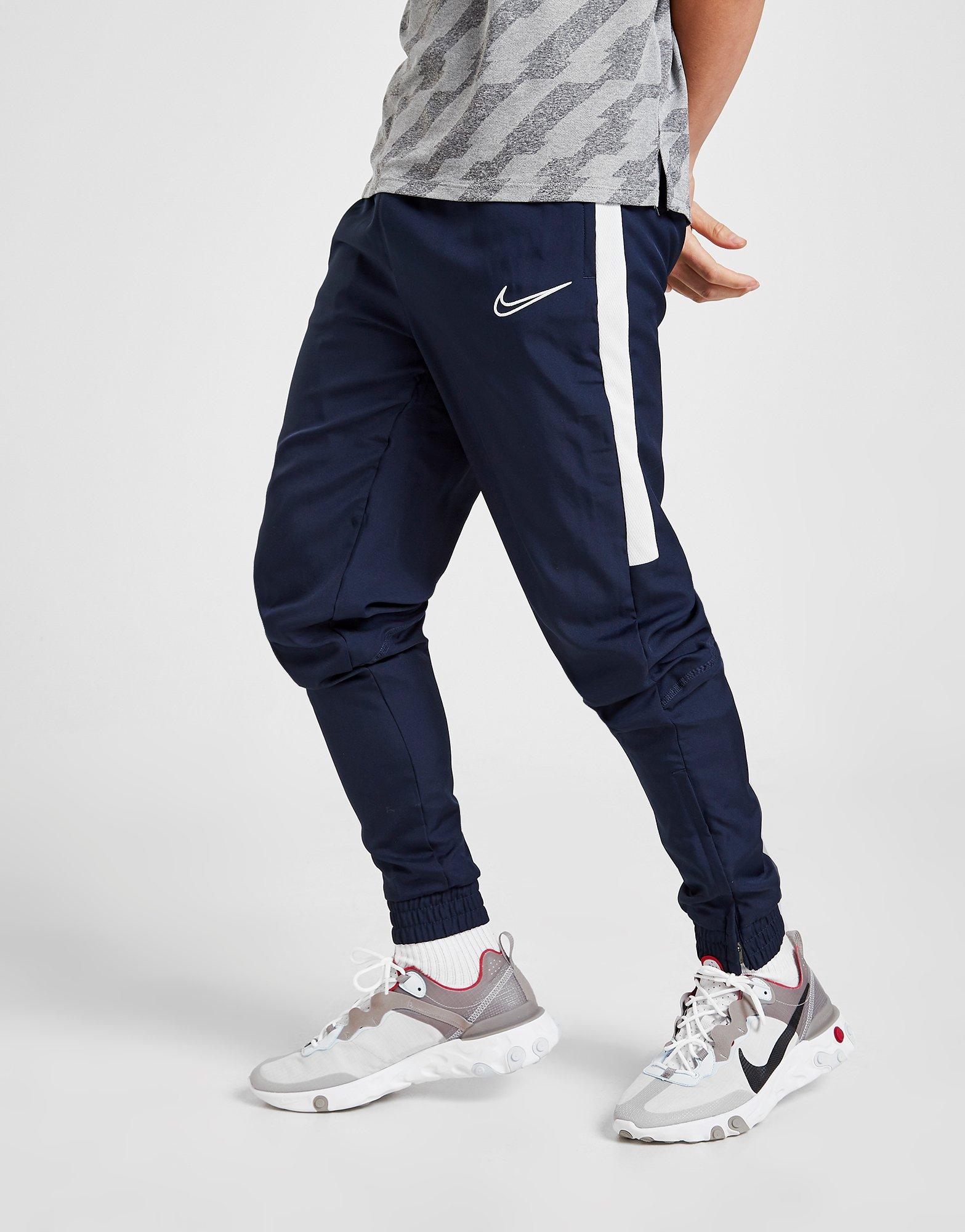 nike academy track pants blue