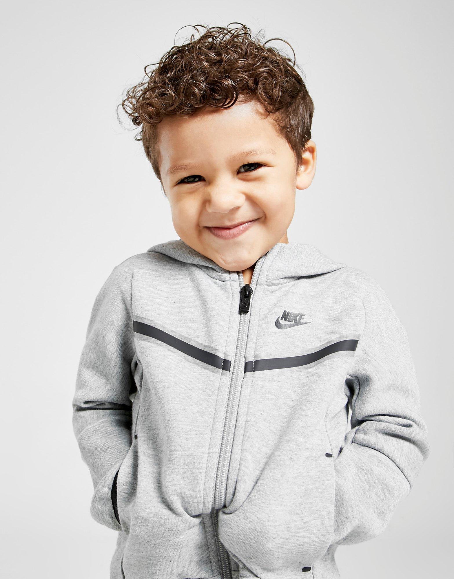 nike tech trackies