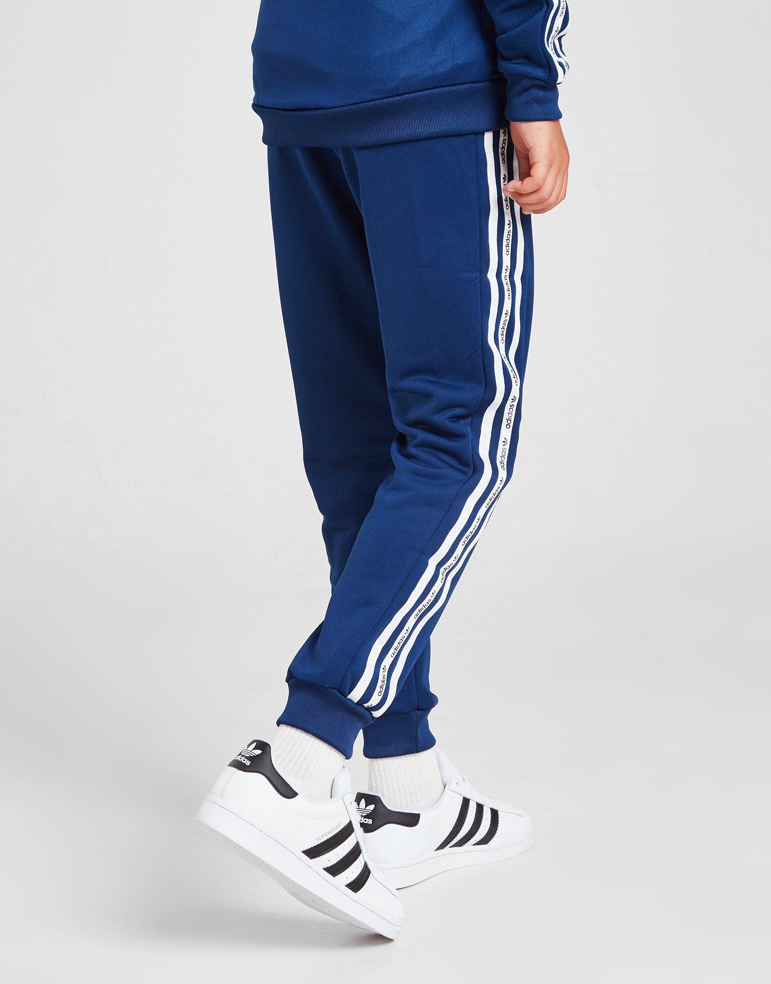 adidas pants blue white stripe