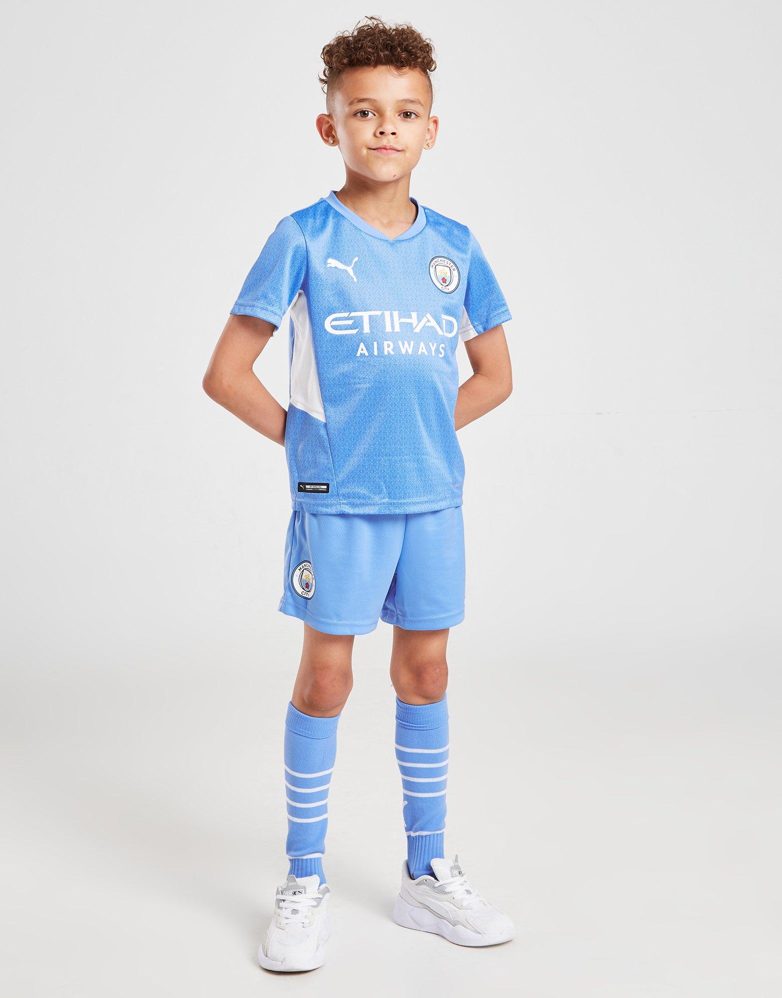 Man city store junior kit