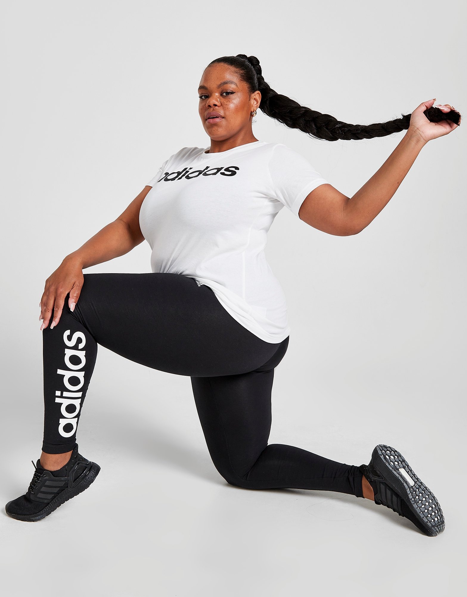 Essentials High-Waisted Logo Leggings (Plus Size)