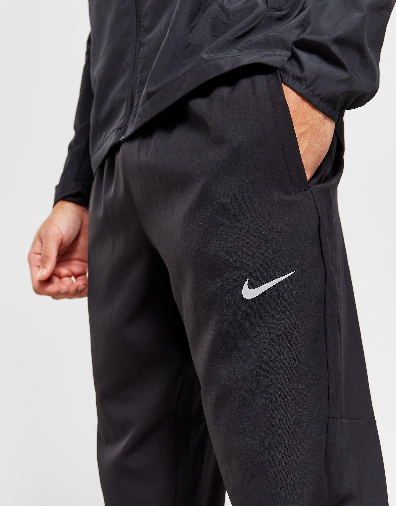 Nike Running woven joggers in black