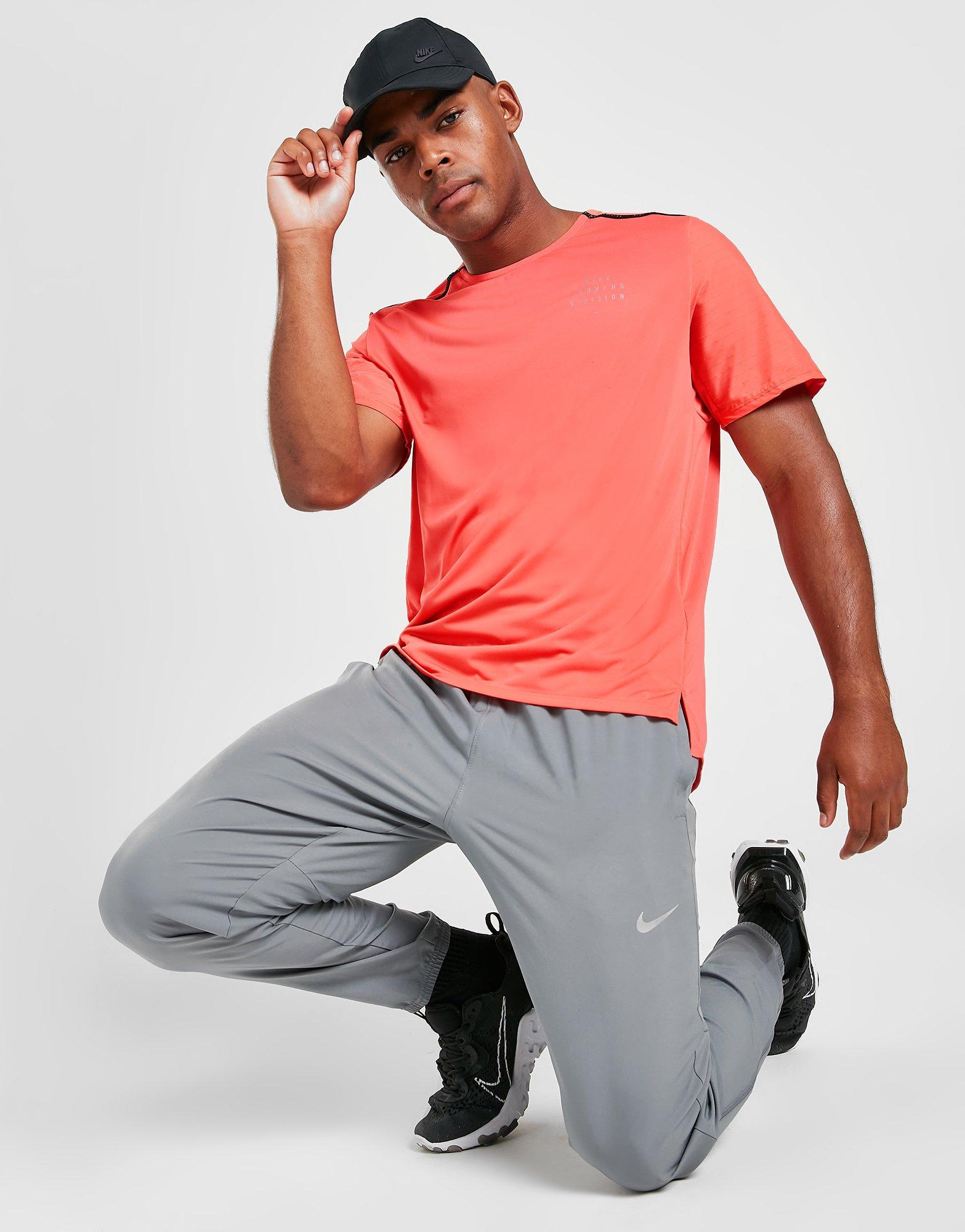 Pants and jeans Jordan Dri-FIT Sport Woven Pant Black/ Gym Red/ Gym Red