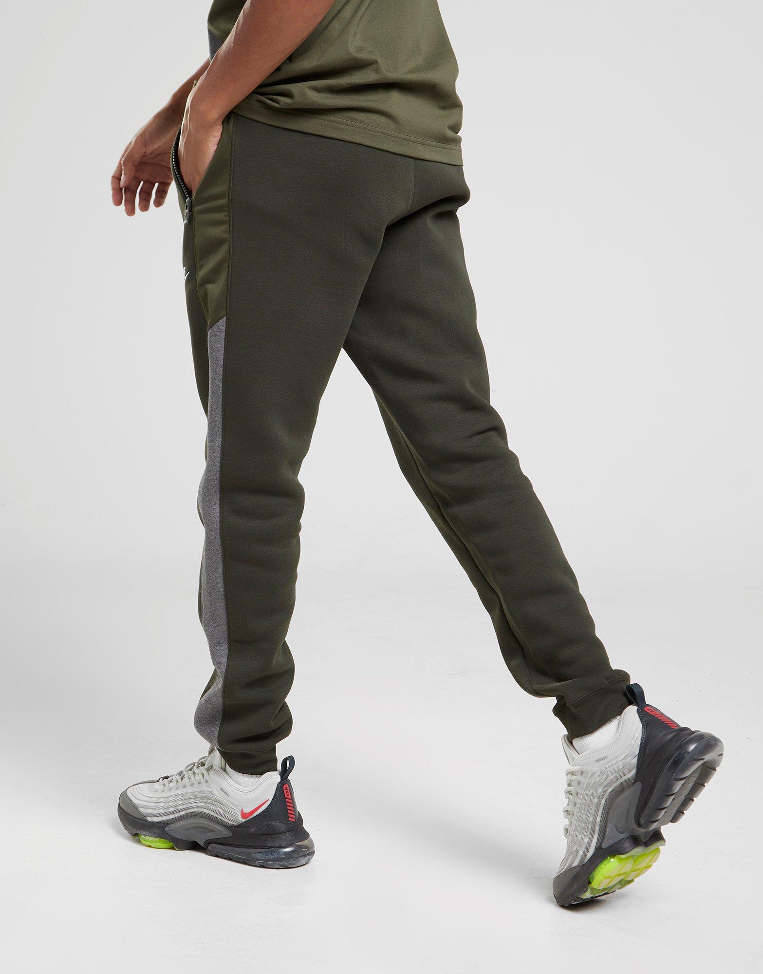 olive green nike tech pants