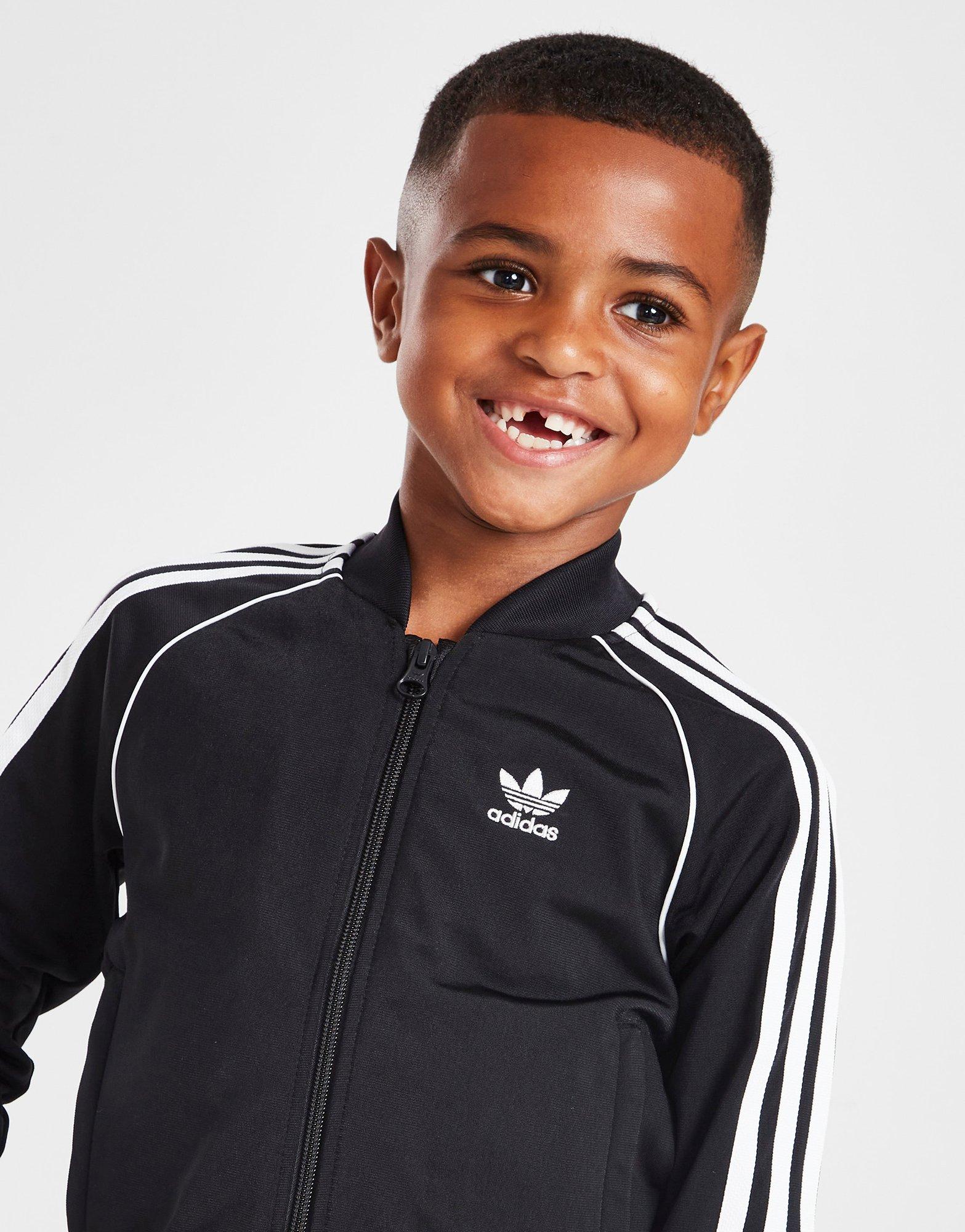 Childrens black adidas on sale tracksuit